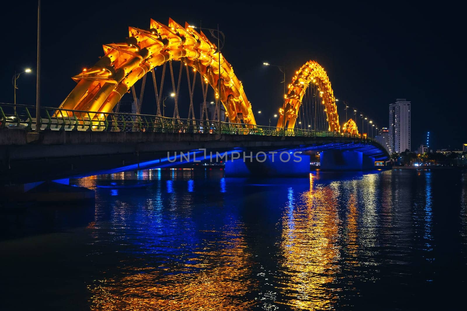 Dragon Bridge over Han River is a famous landmark in city of Da Nang in Vietnam at night