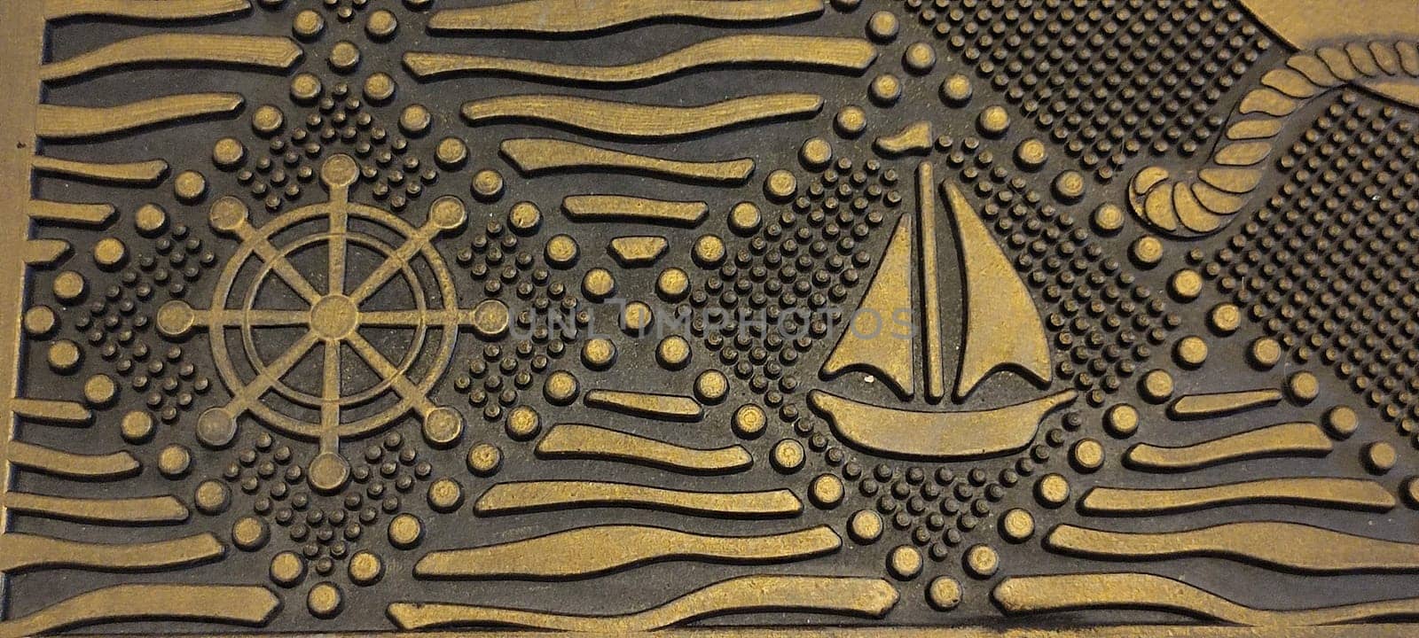 yellow brown floor rug with nautical marine theme, anchor ships, shells, home objects, background interior design materials .High quality photo