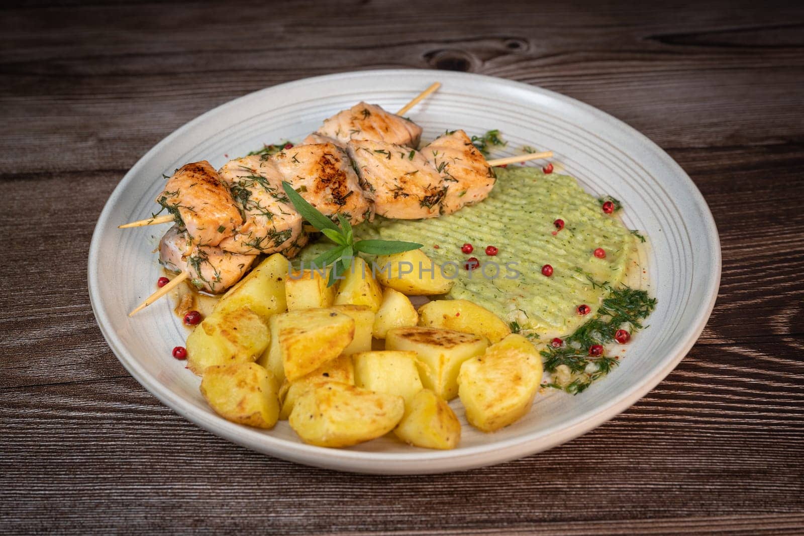 Barbecued salmon skewer with potatoes and broccoli Puree, High quality photo