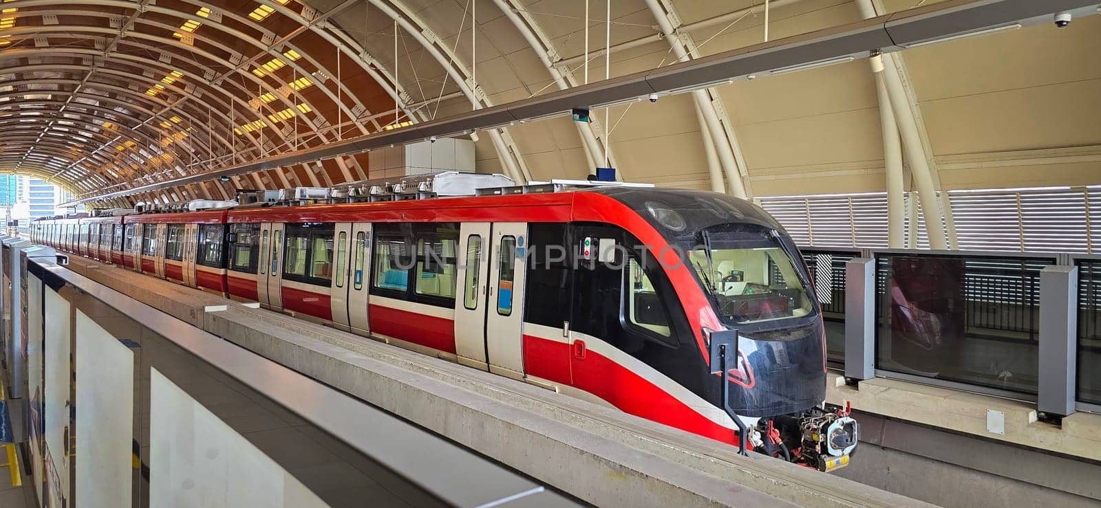 Light Rail Transit or LRT or rail transport system in Indonesia, modern metro train stationed at an urban platform, showcasing efficient public transport and contemporary infrastructure