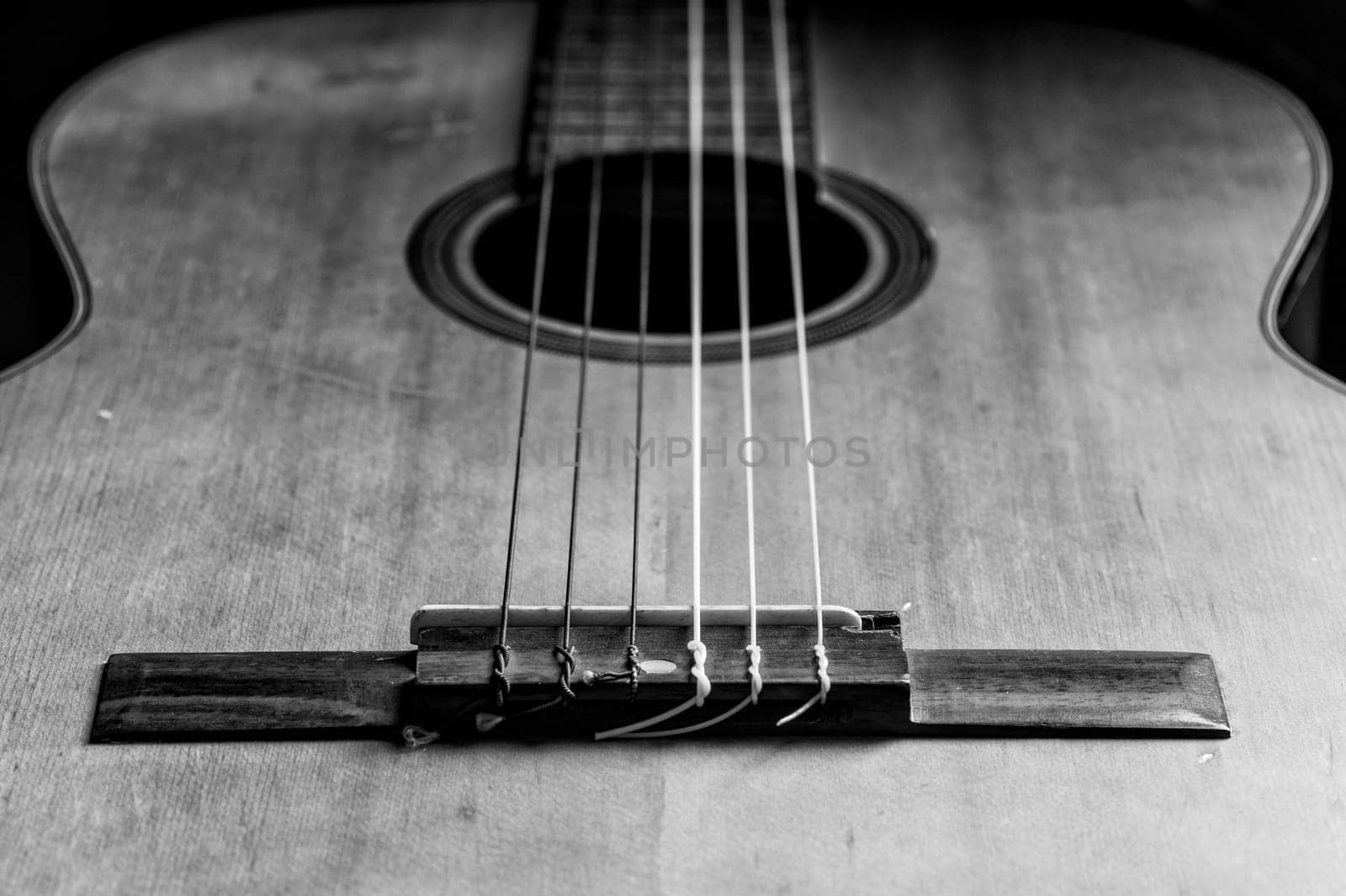 abstract classical guitar. closeup details of the guitar with shallow depth of field.