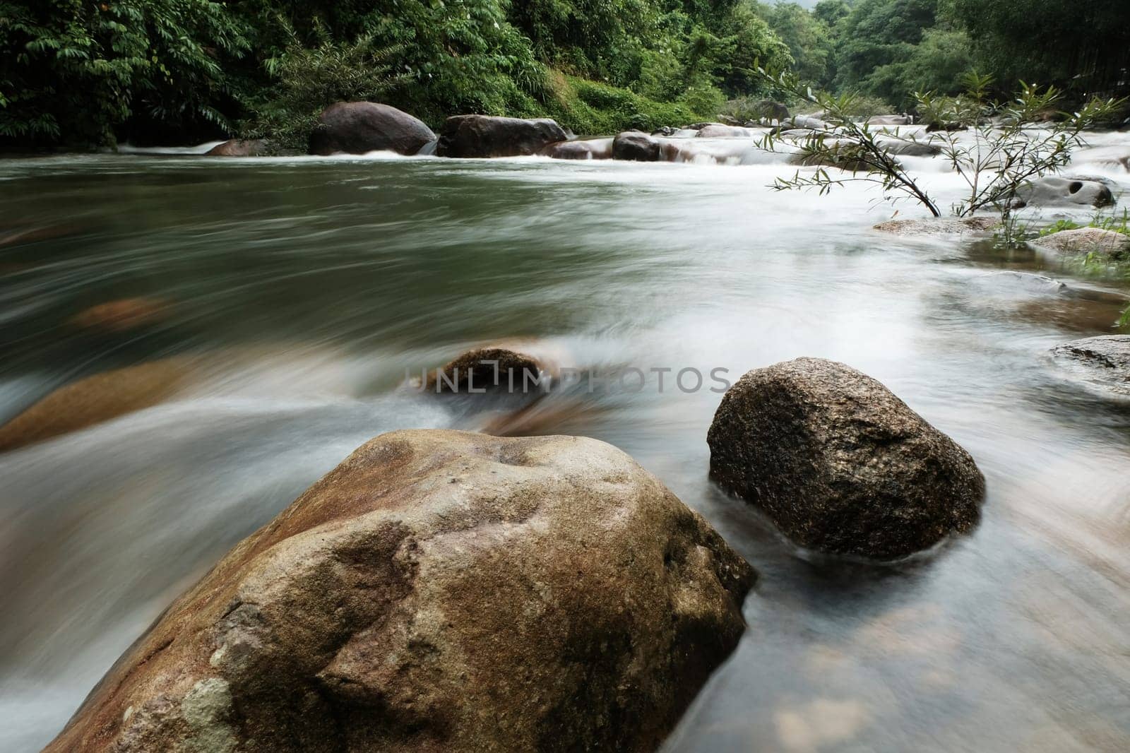 Beautiful waterfall trough the rocks in Chanthaburi province, Thailand.