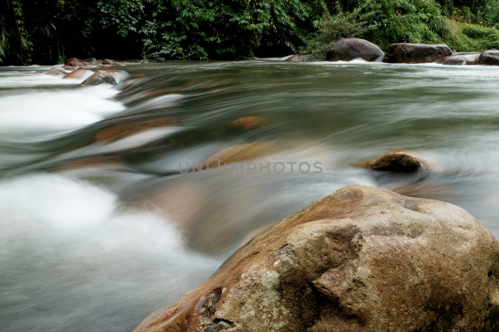 Beautiful waterfall trough the rocks in Chanthaburi province, Thailand.