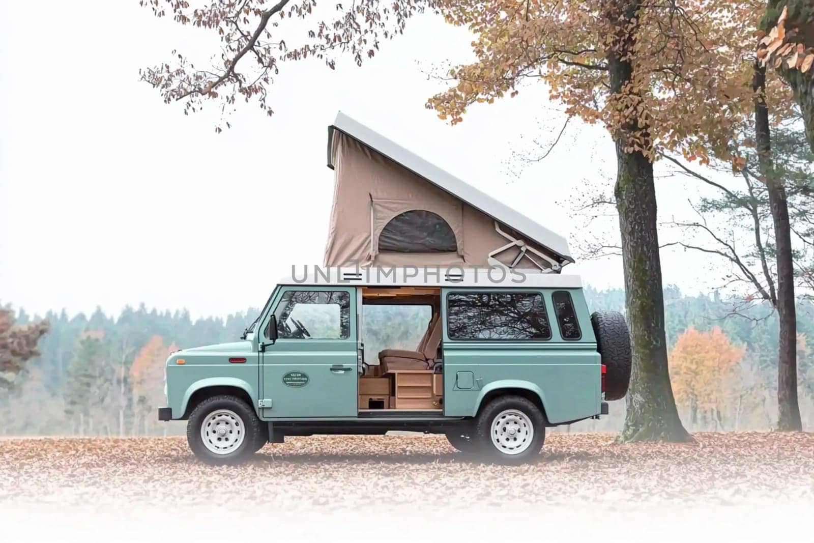 Camper van is parked in a field, its doors open to a beautiful day. The van is a symbol of freedom and adventure, and it's the perfect way to explore the great outdoors