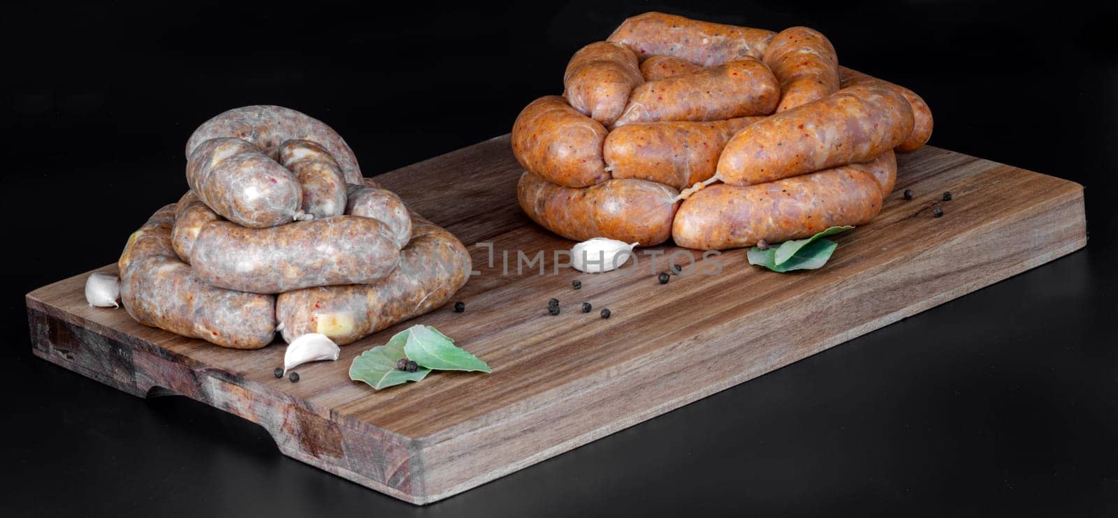 A colorful display of gourmet sausages on a rustic wooden board, garnished with spices to enhance flavor