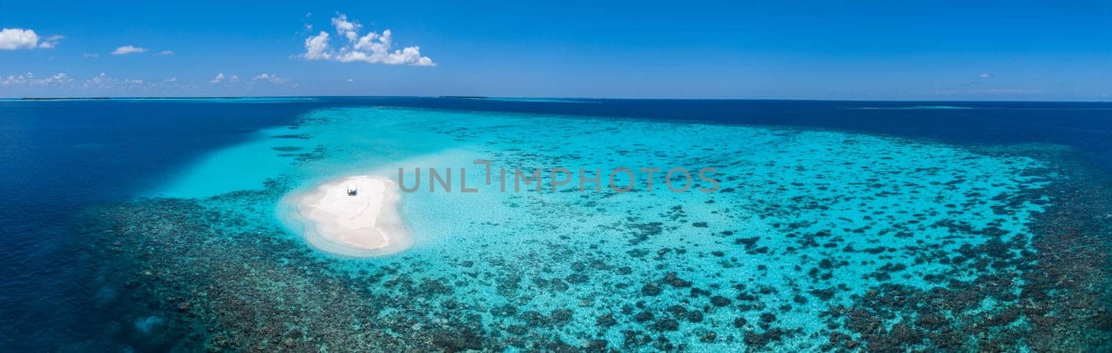 Sandbank experience with picnic in Gaafu Dhaalu Atoll Maguhdhuvaa Island, Maldives. High quality photo