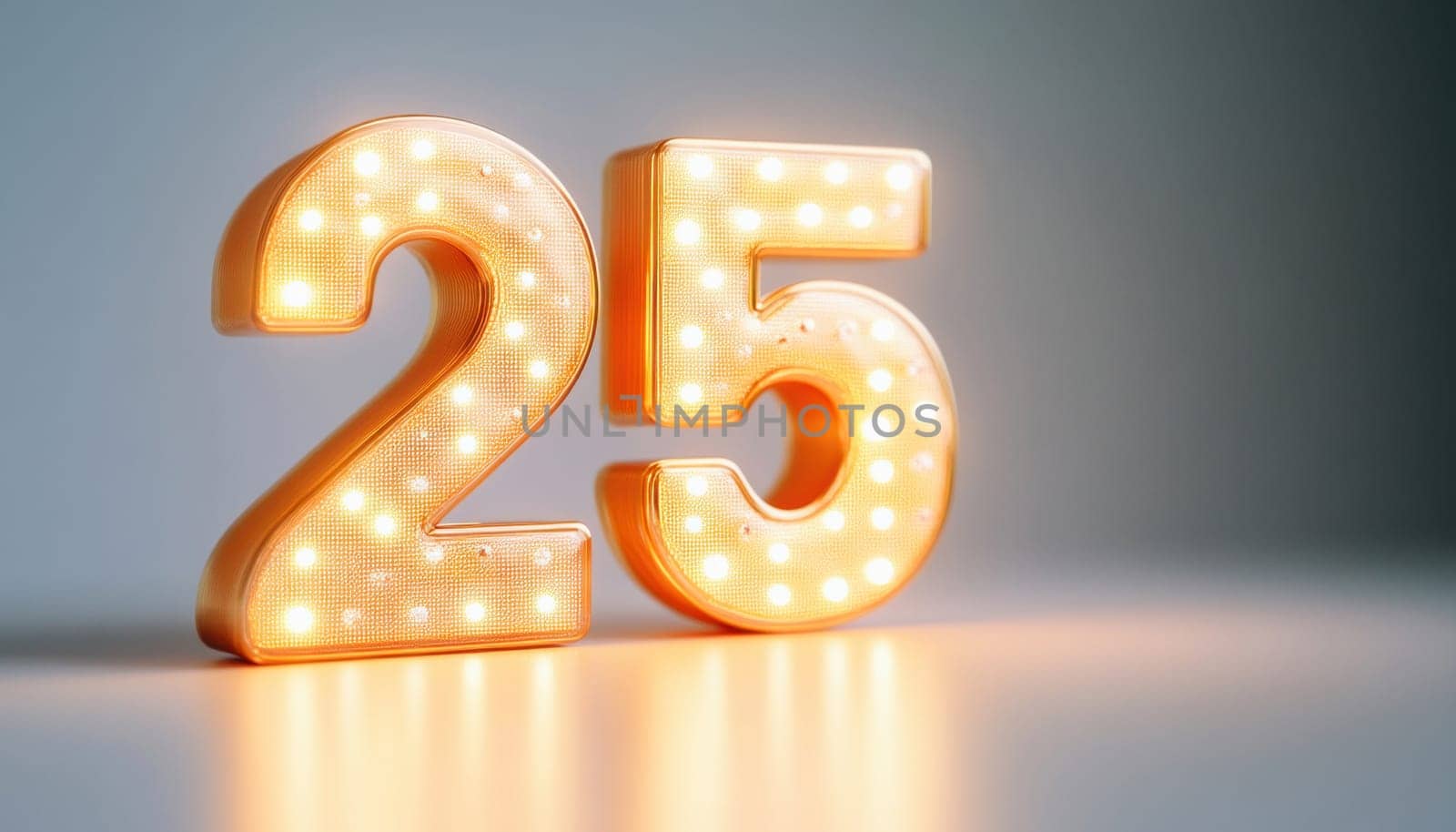 Gold number twenty five sign with light bulbs illuminating a gray background