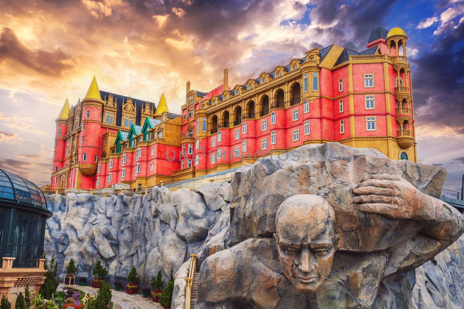 Fantastic fabulous stone castle on a mountain at sunset in Ba Na Hills Park in Da Nang in Vietnam in Asia