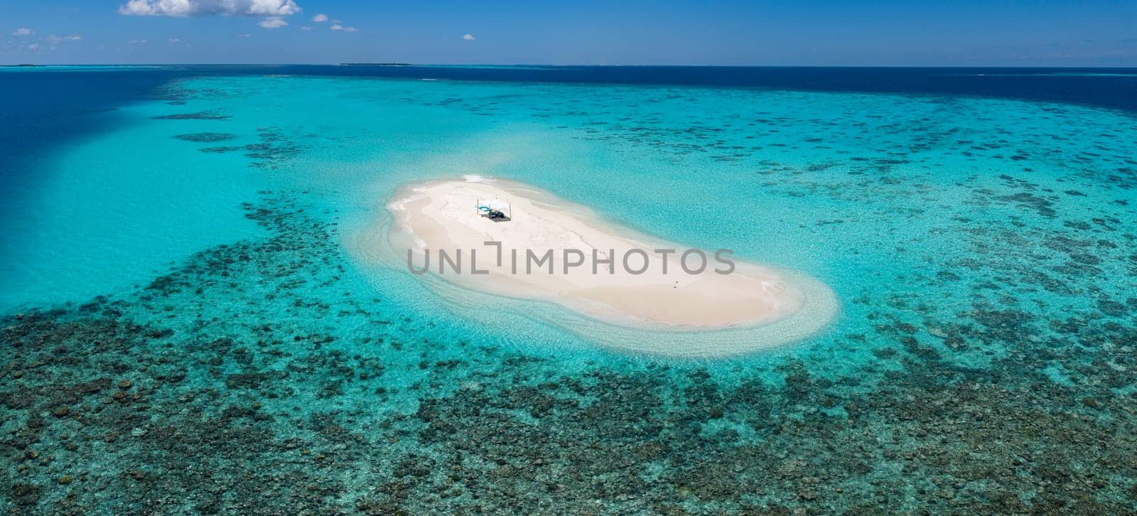 Sandbank experience with picnic in Gaafu Dhaalu Atoll Maguhdhuvaa Island, Maldives. High quality photo