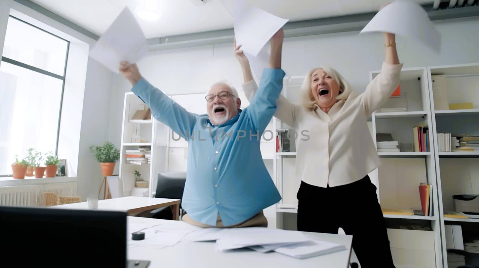 A man and a woman are joyfully throwing papers high up in the air, creating a cheerful and lively atmosphere all around them