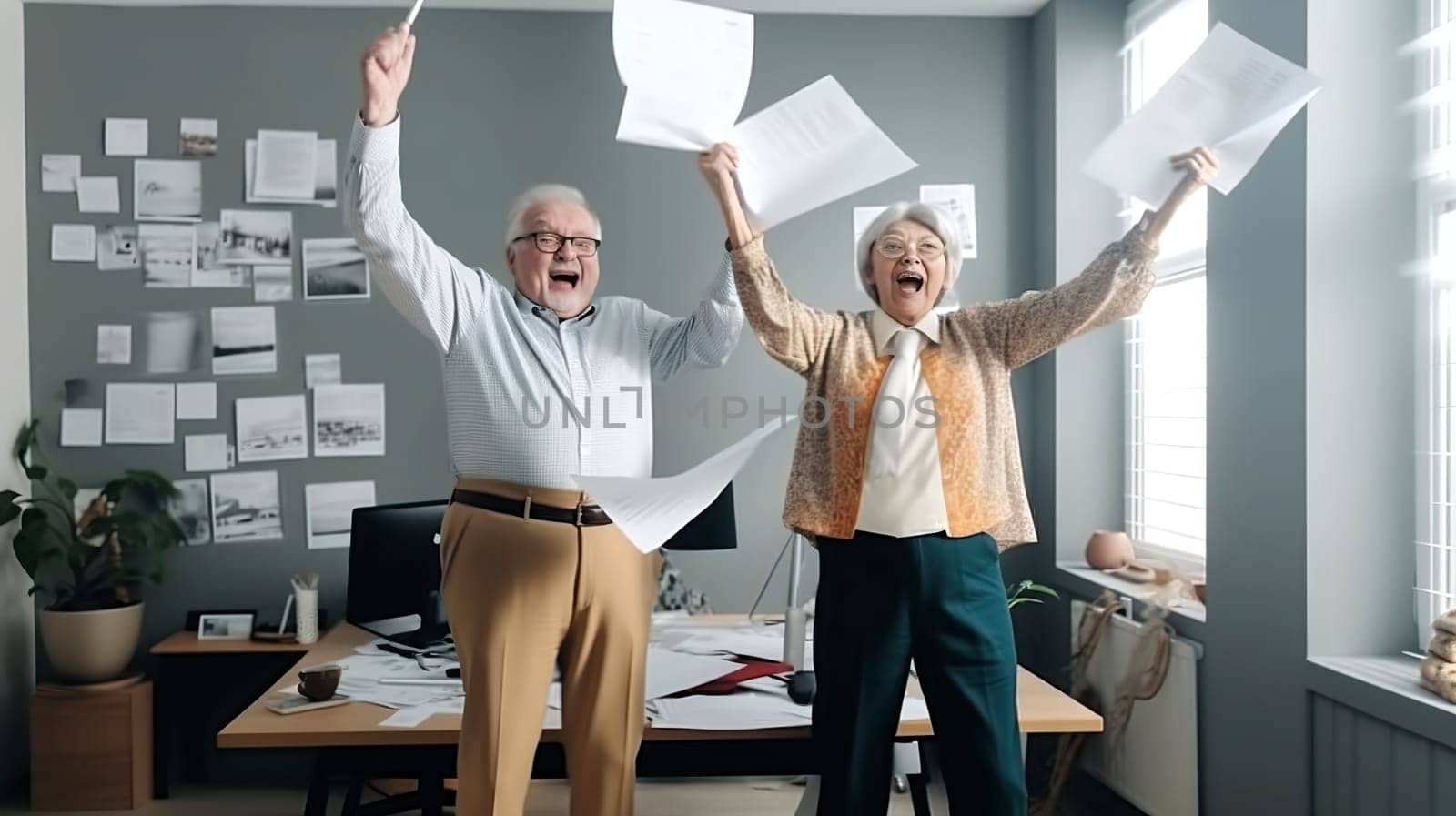 A man and a woman are joyfully throwing papers high up in the air, creating a cheerful and lively atmosphere all around them
