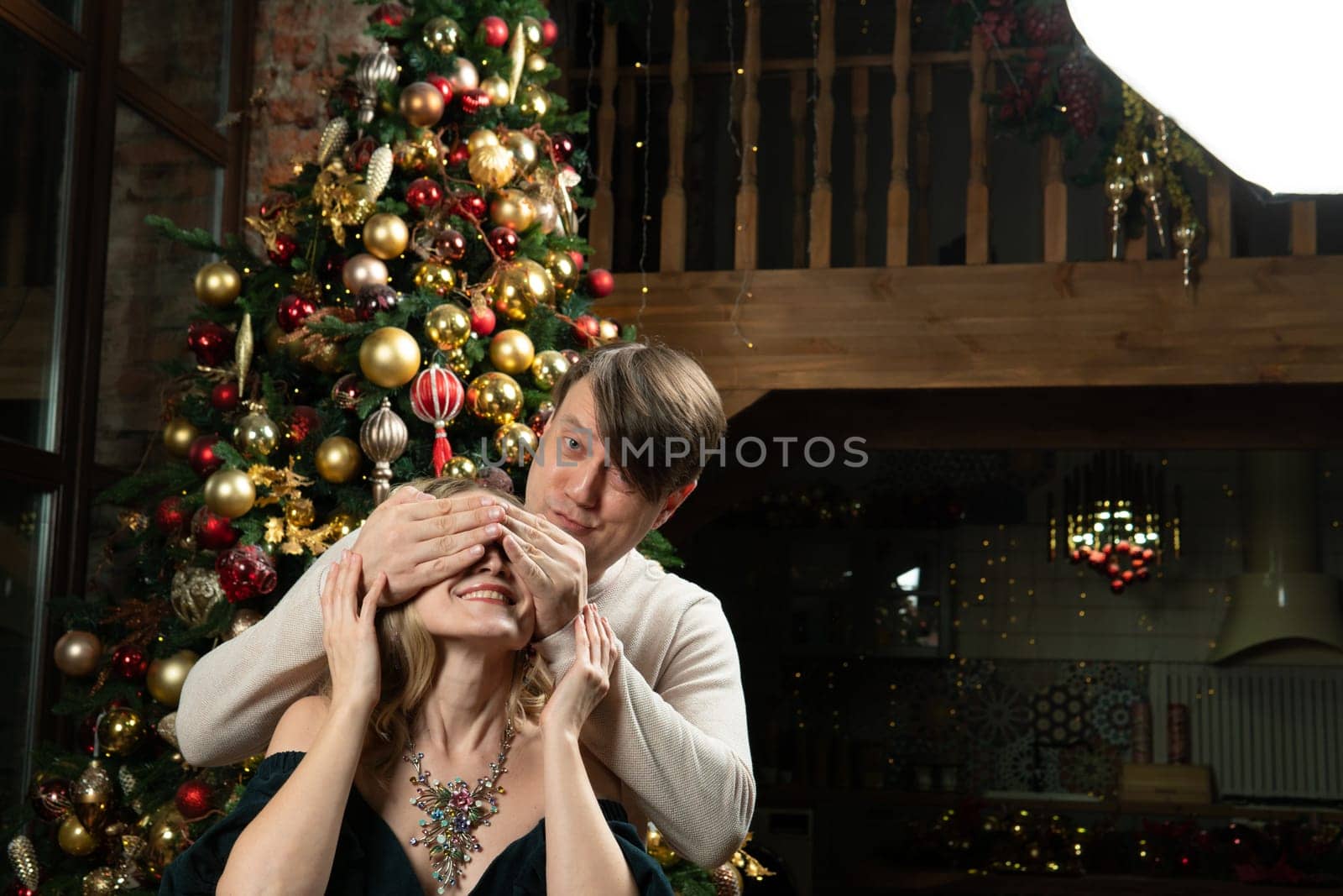 decoration family tree woman happiness man december christmas celebration smiling winter joy