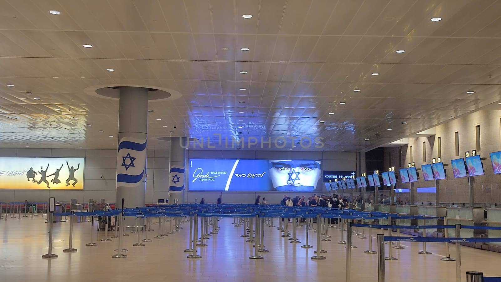 15 October 2024 Tel-Aviv Israel Ben Gurion airport Terminal 3, tourist lounge, flag Israeli, people conture High quality photo