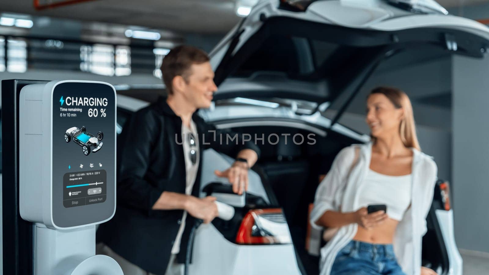 Young couple travel with EV electric car to shopping center parking lot innards by biancoblue