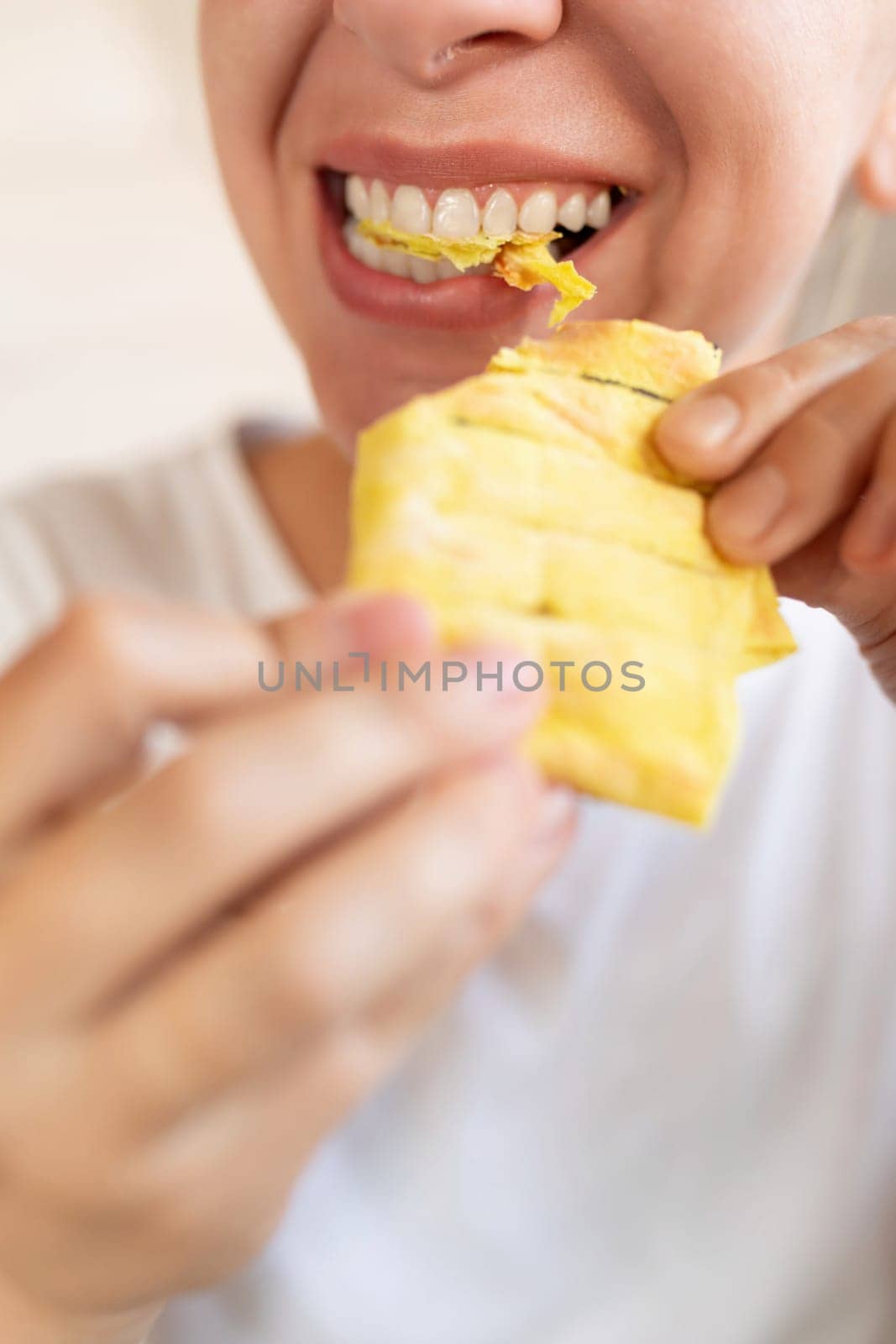 young woman enjoying food while dieting by TRMK