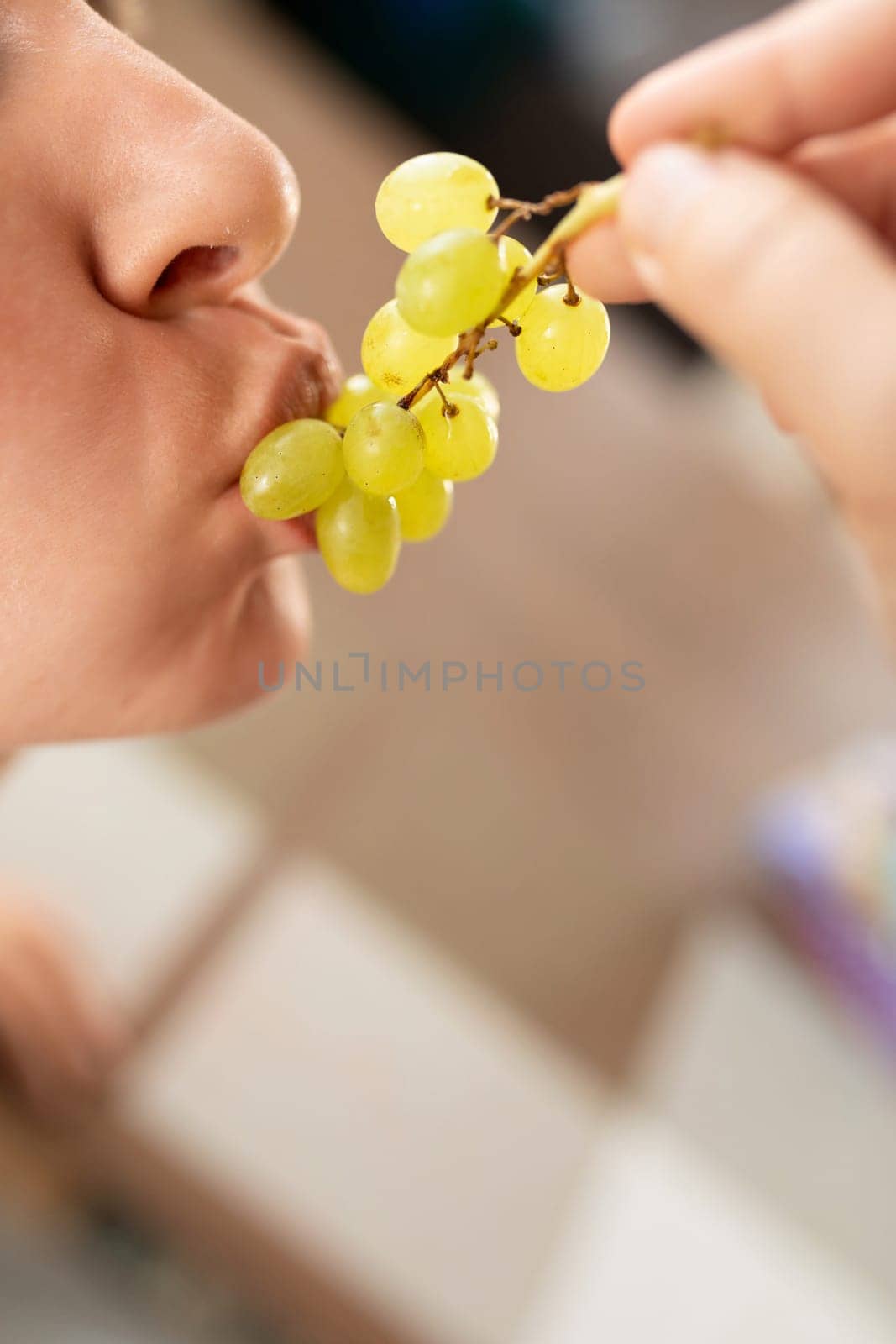 woman eating fruit during snack.