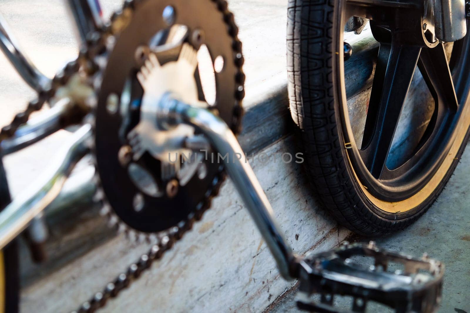 Close up of bmx bike on a ramp in a skatepark, BMX concept.