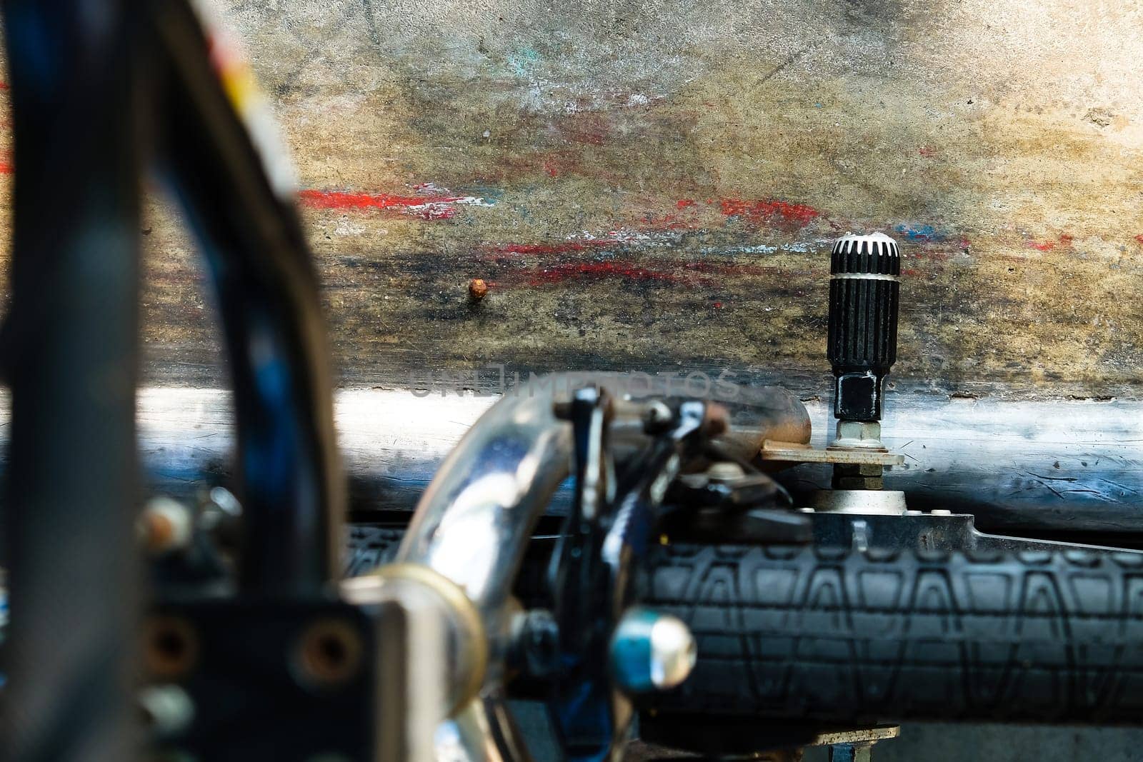 Close up of bmx bike on a ramp in a skatepark, BMX concept.