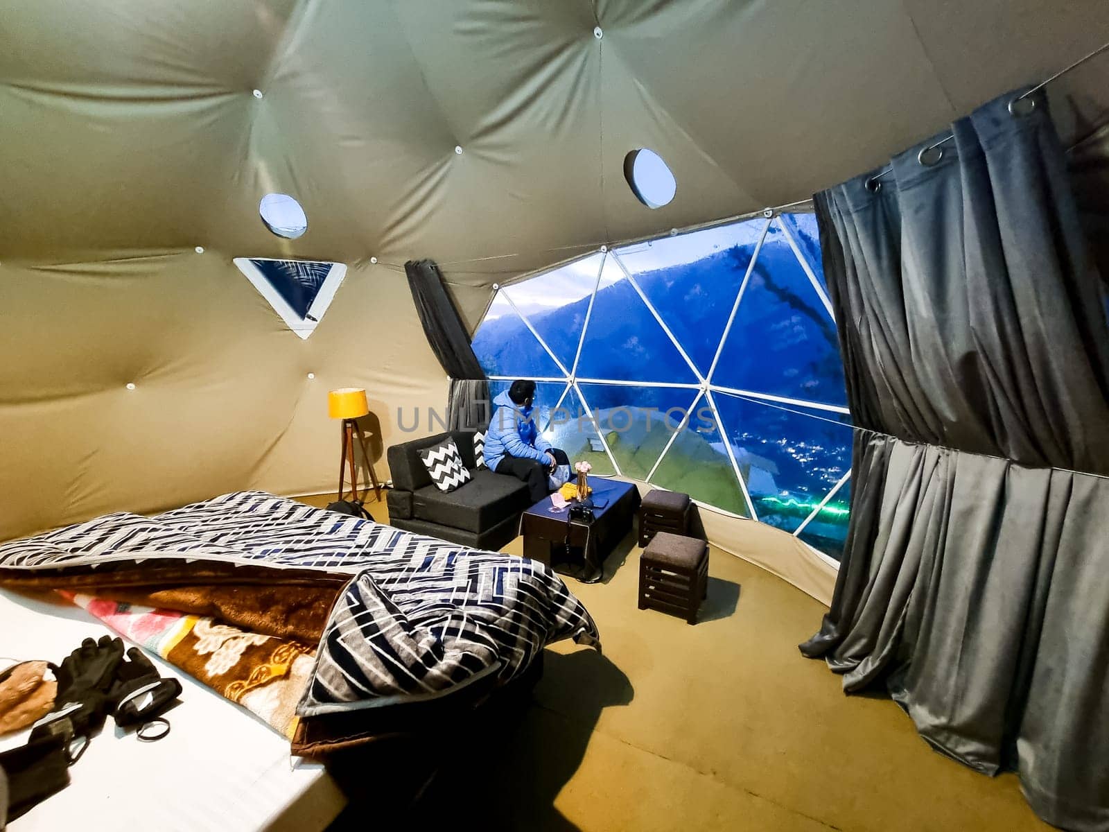 Interior of geodesic, triangular and swiss tents at a popular glamping spot near hampta village manali for eco freindly and comfortable adventure stays in India
