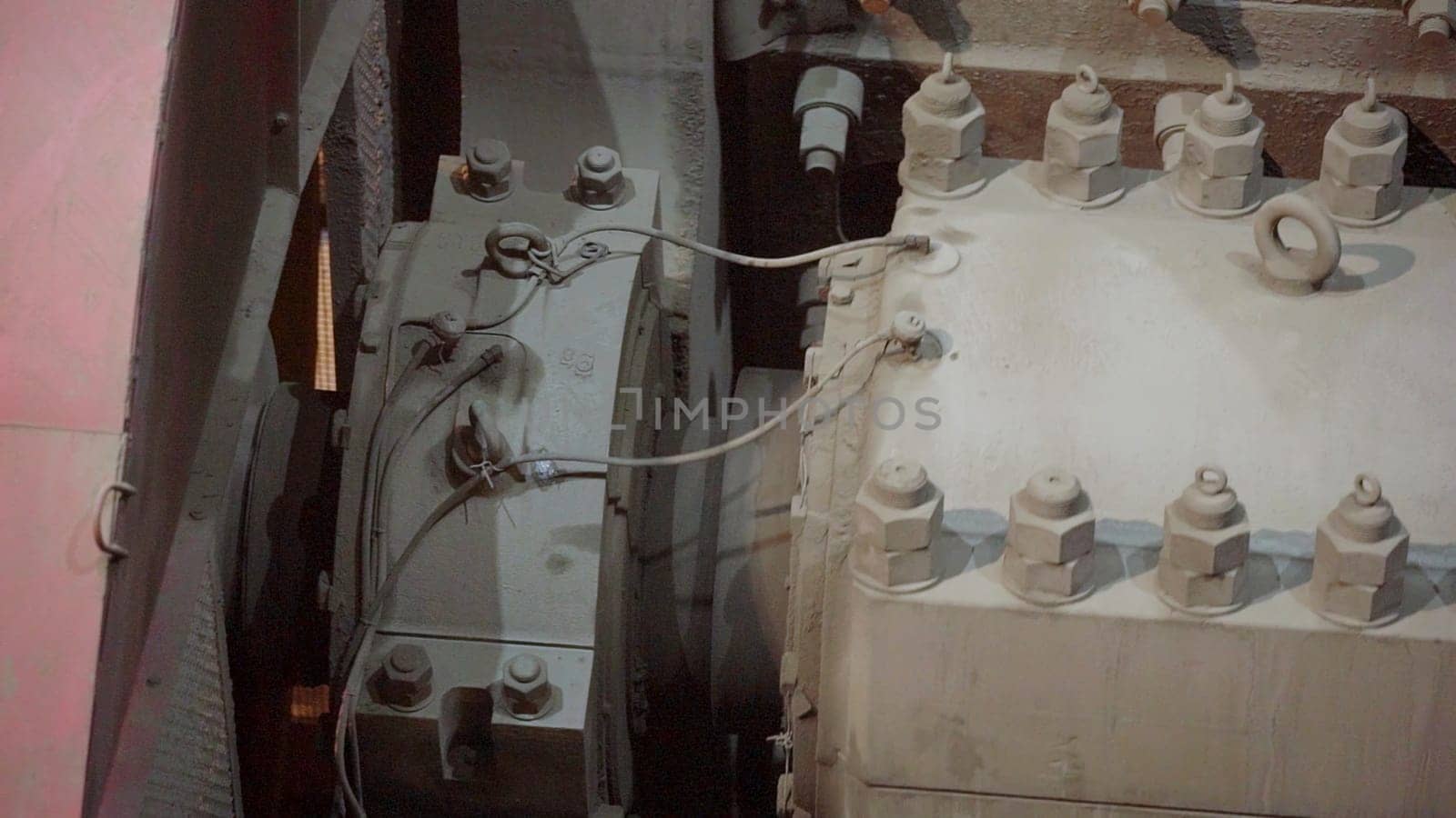 A detailed view reveals intricate industrial machinery, emphasizing the electrical components and extensive wiring used. Stock Clip