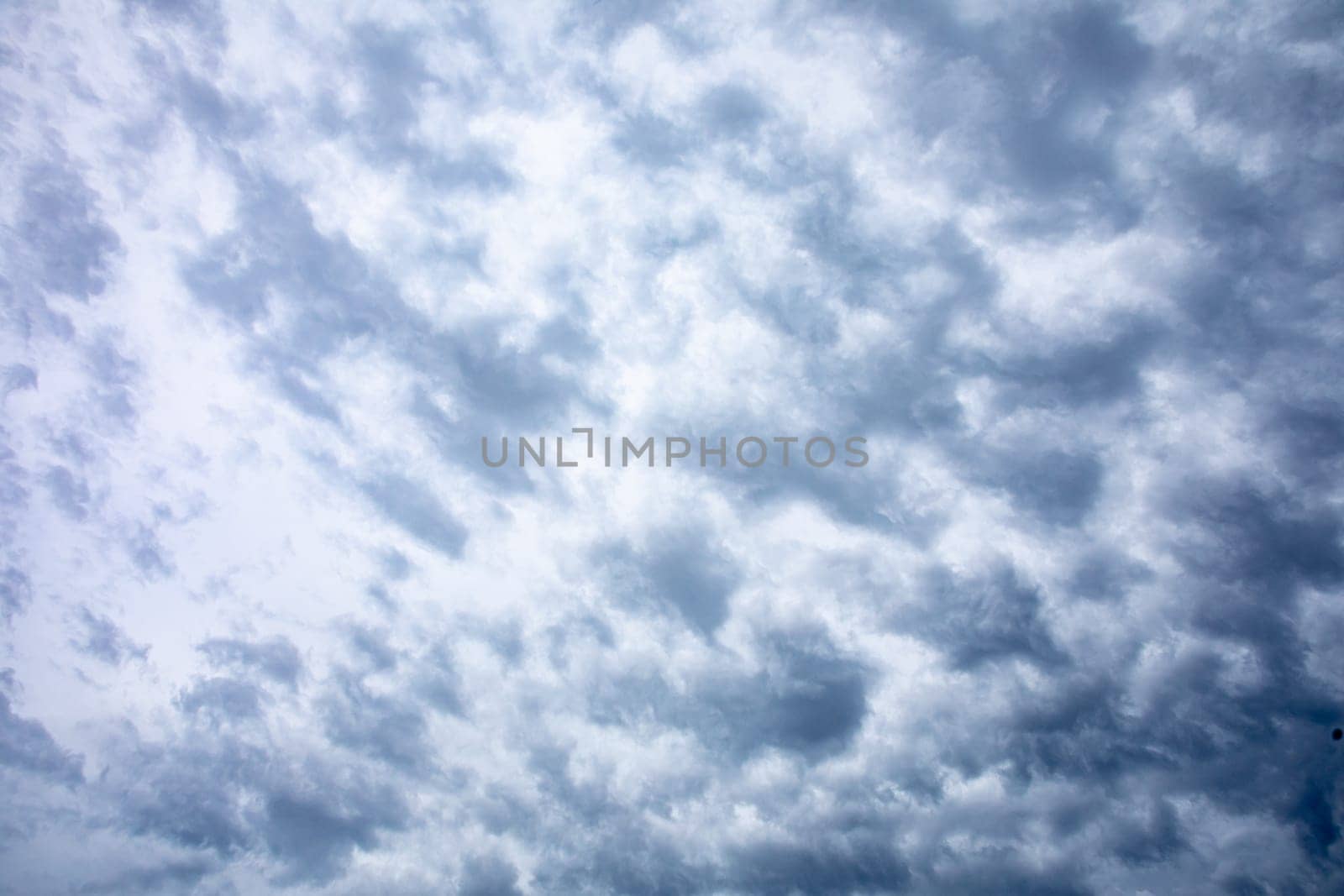 A captivating display of beautifully textured clouds that fill the vast sky, reflecting the natural beauty around us