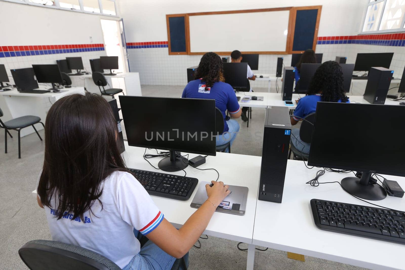 pilao arcado, bahia, brazil - november 13, 2024: students from a public school in the state of Bahia are seen in a computer lab.