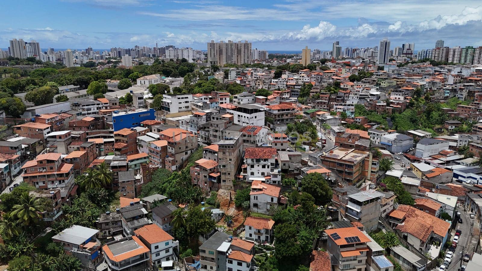 salvador, bahia, brazil - october 16, 2024: Aerial view of housing in a favela community in the city of Salvador.