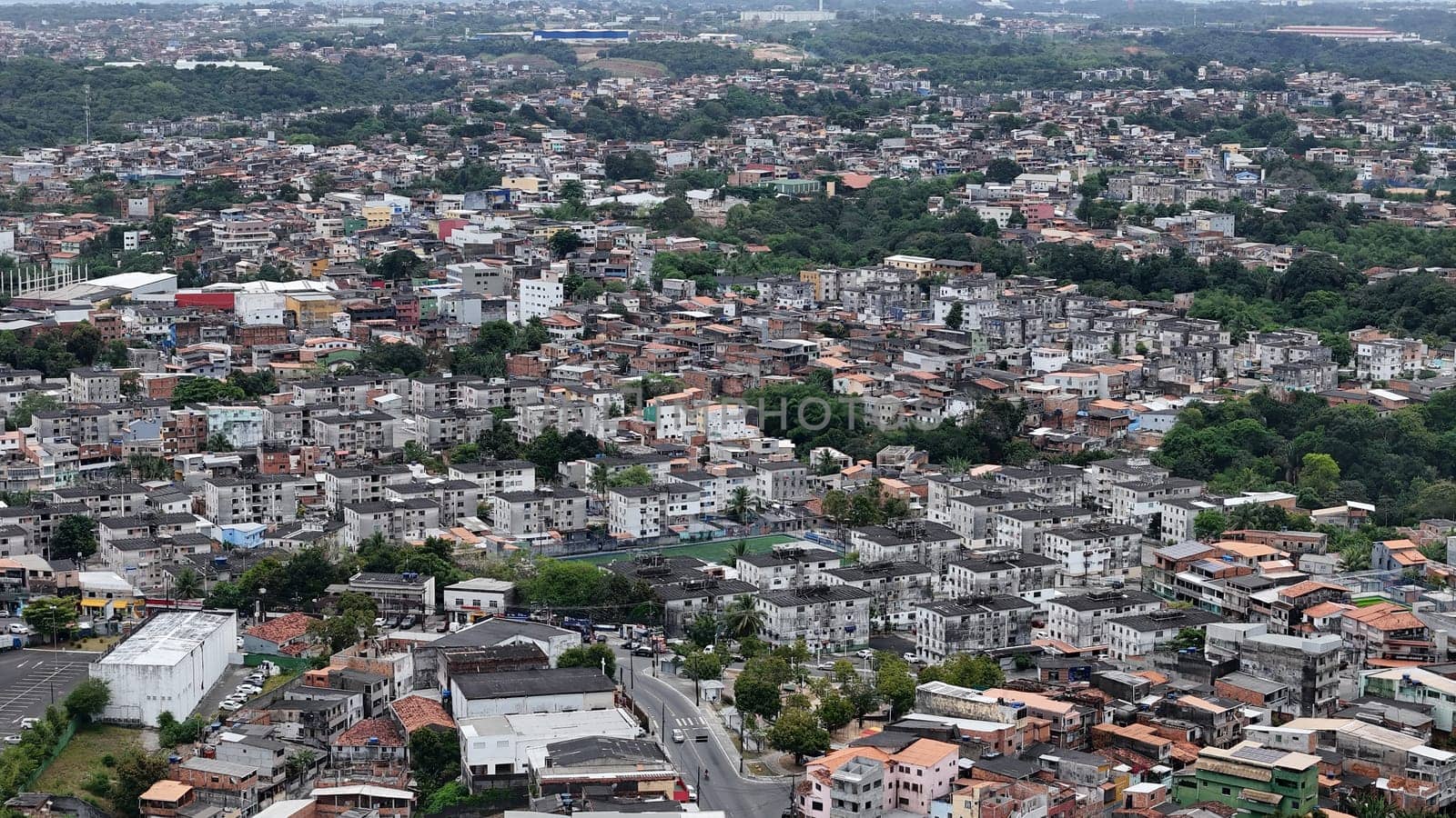 salvador, bahia, brazil - october 16, 2024: Aerial view of housing in a favela community in the city of Salvador.