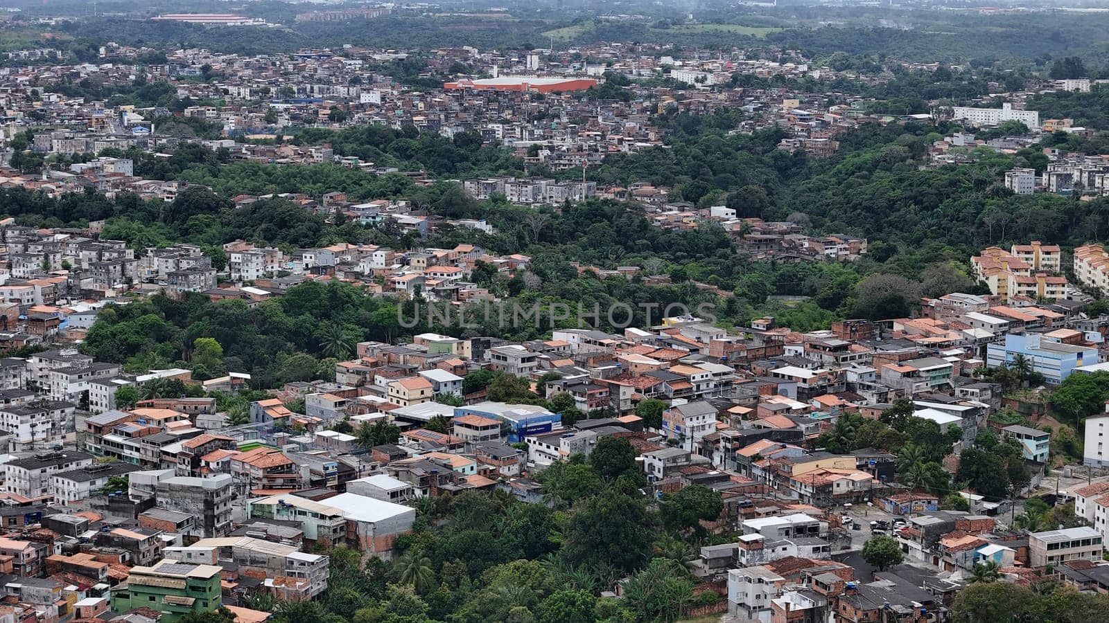 salvador, bahia, brazil - october 16, 2024: Aerial view of housing in a favela community in the city of Salvador.