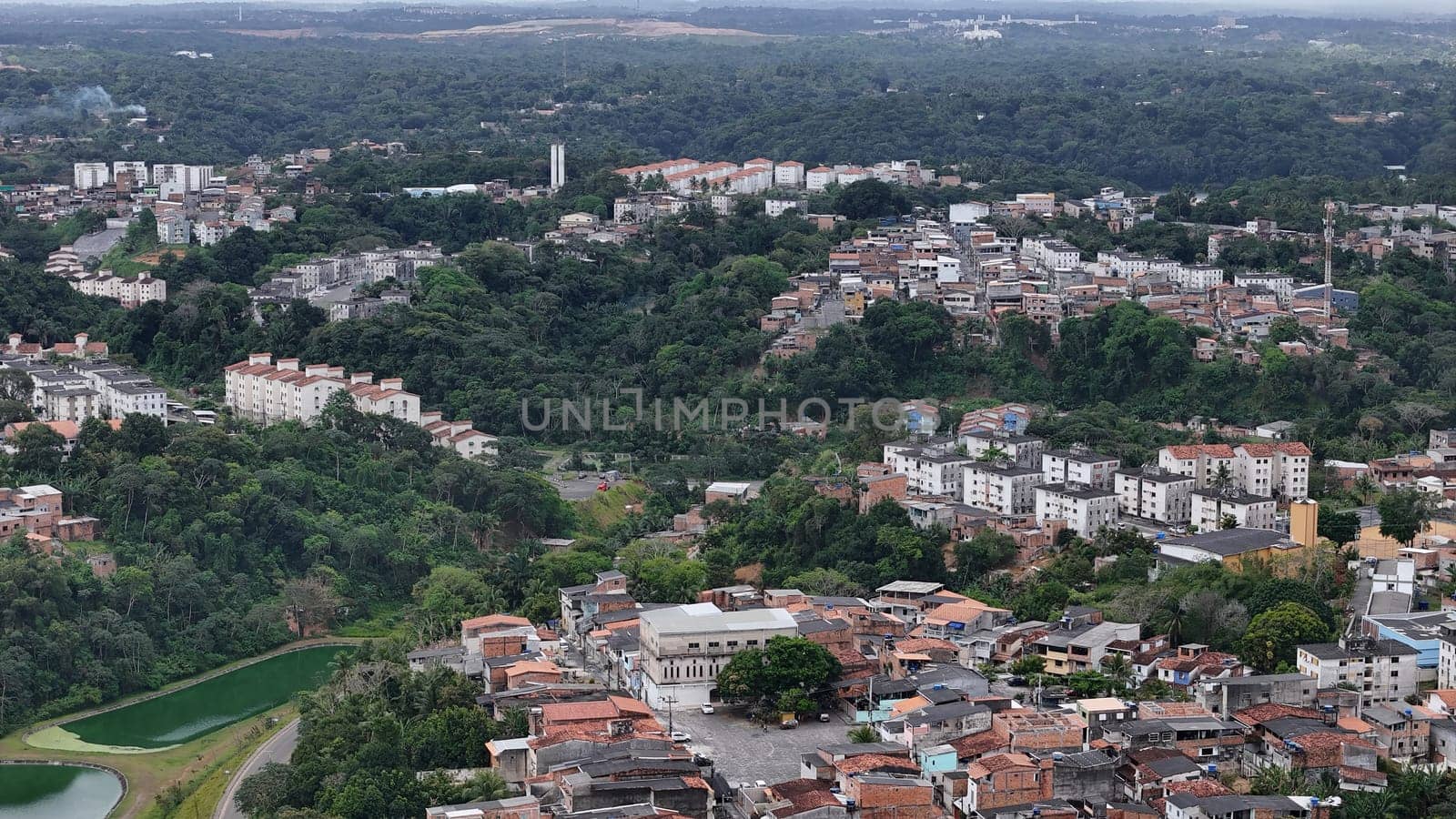 salvador, bahia, brazil - october 16, 2024: Aerial view of housing in a favela community in the city of Salvador.