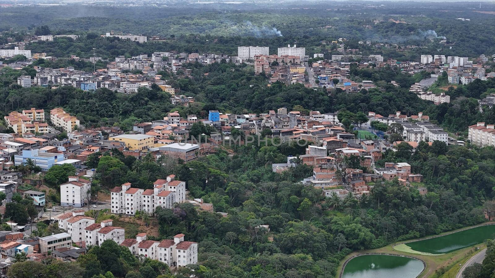 salvador, bahia, brazil - october 16, 2024: Aerial view of housing in a favela community in the city of Salvador.