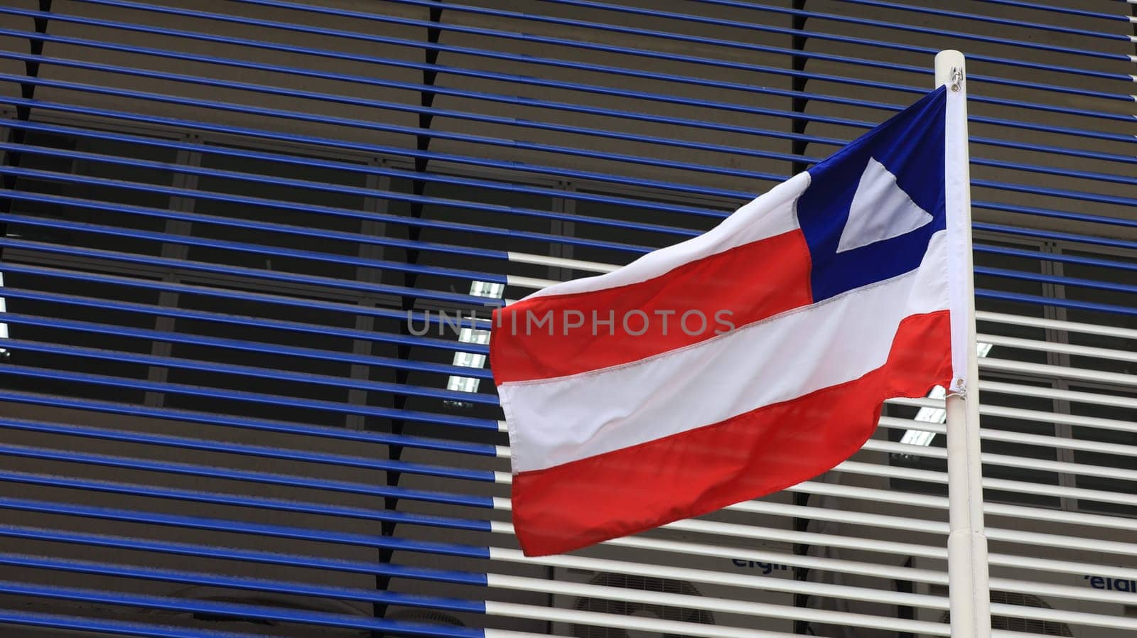 salvador, bahia, brazil - september 18, 2023: Bahia state flag seen on a flagpole in the city of Salvador.