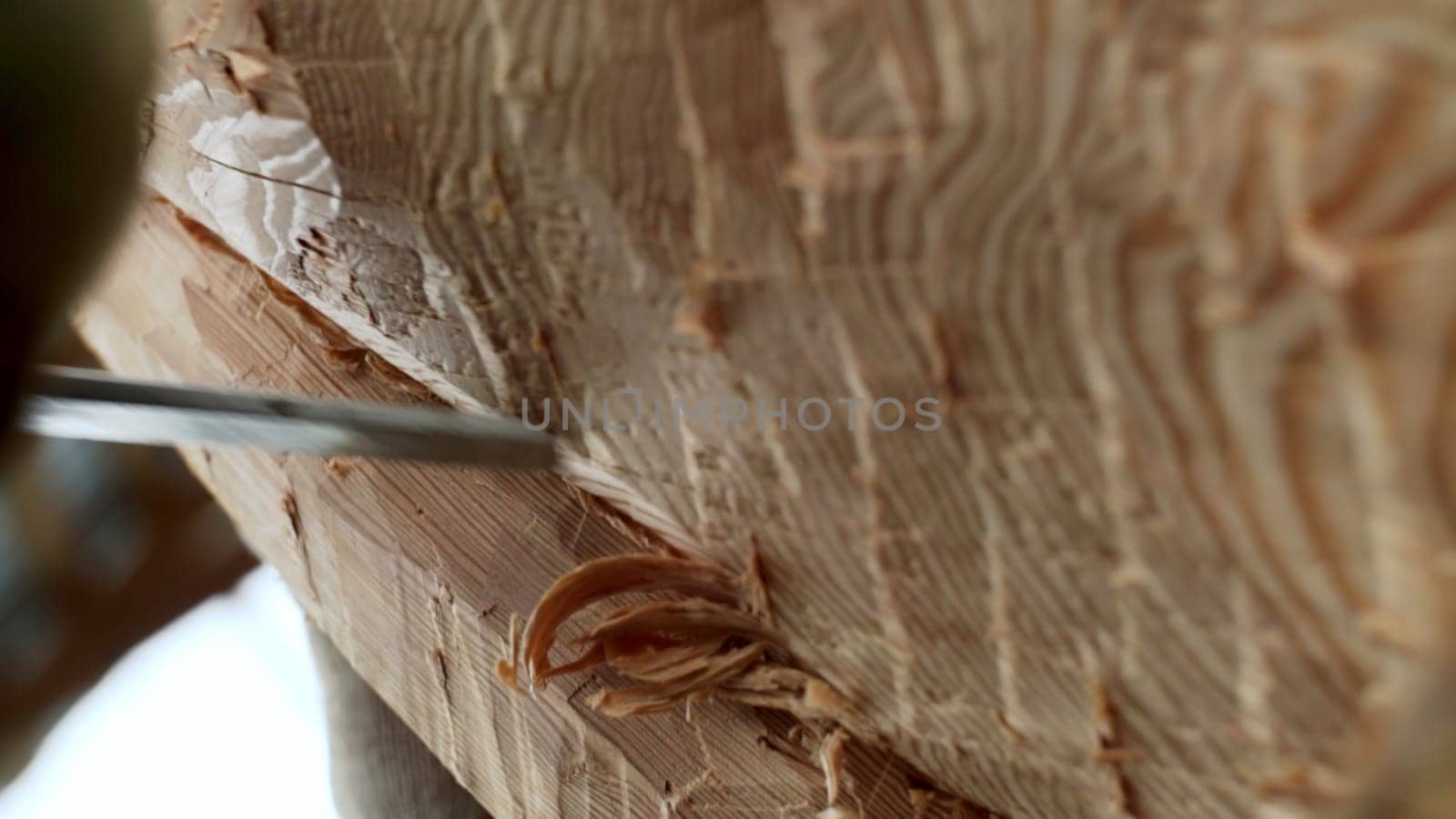 A close up of a craftsman chiseling wood, highlighting the extraordinary beauty of artisan woodworking. Stock Clip