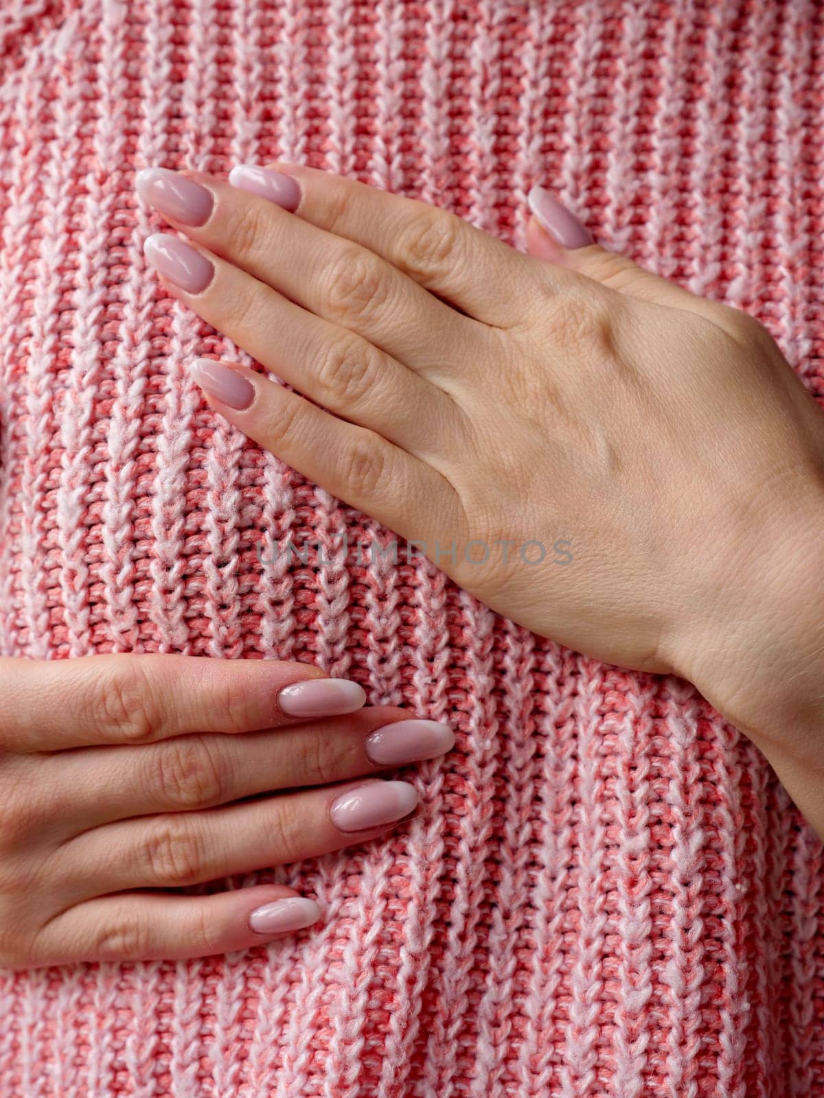 Pink October Breast Cancer Awareness month, woman hand with pink Ribbon in hospital for support people life and illness. Vertical