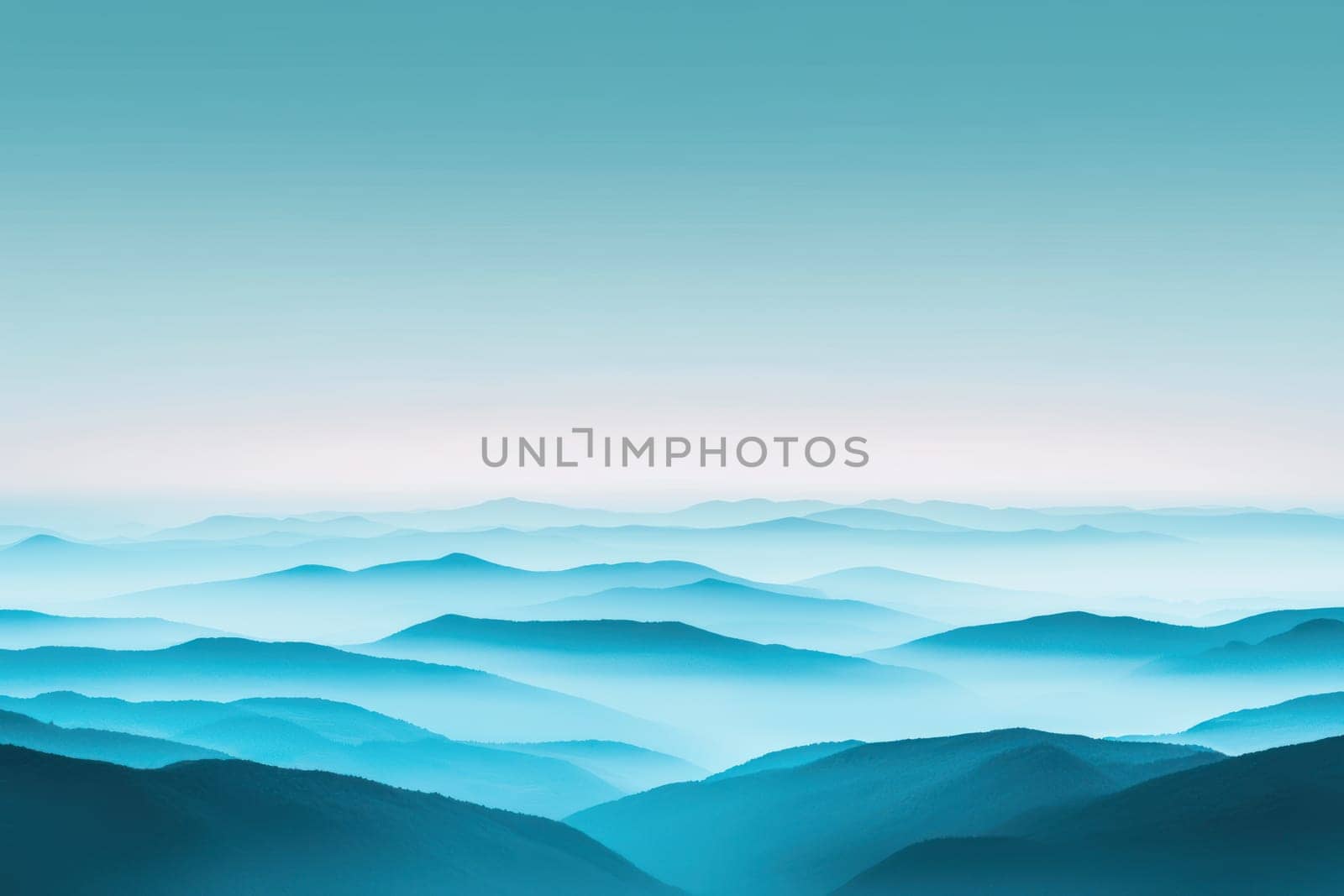 Serene blue mountains under foggy sky create tranquil atmosphere.