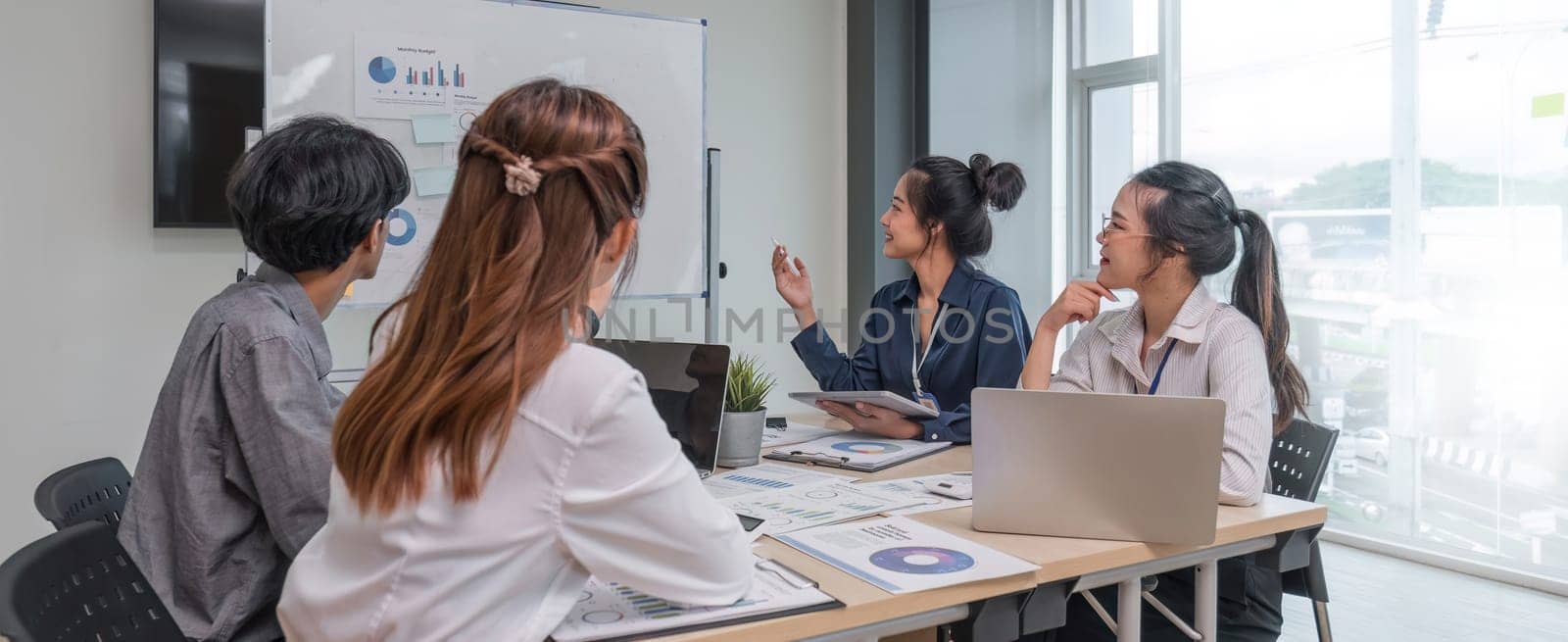 Business financial, accountant discussing with partner are meeting to audit finance planning sales to meet targets set in next year. stock market concept..