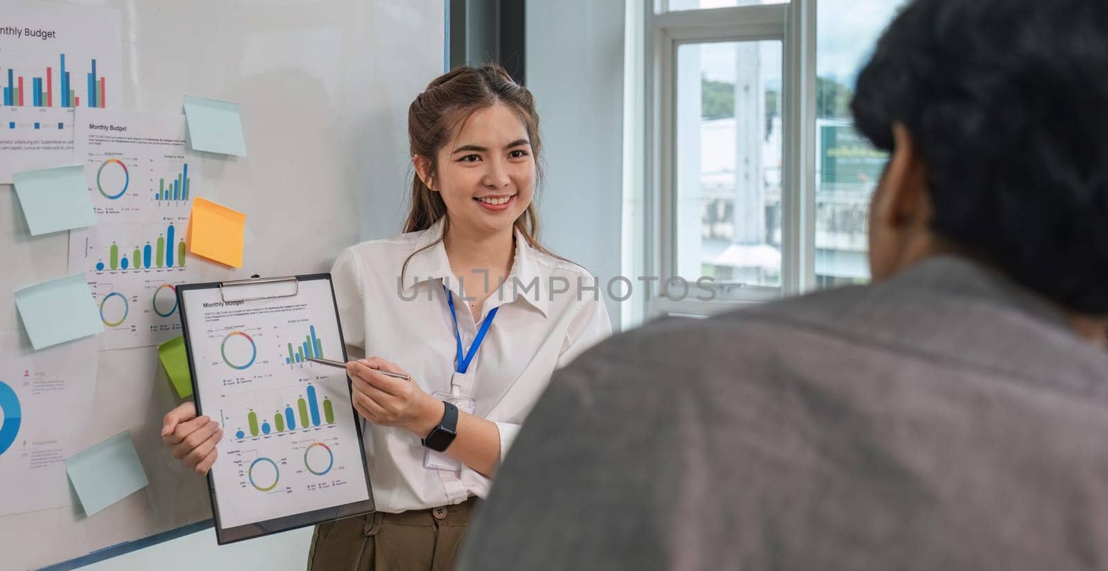 team business people talk project strategy at office meeting room. Businesswoman discuss project planning with colleague at modern workplace while having conversation and advice on financial report.
