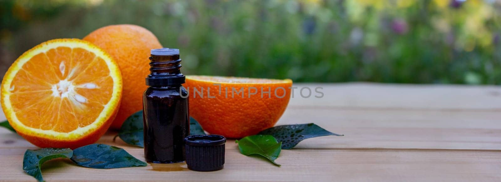 Essential extract of orange oil. Selective focus.