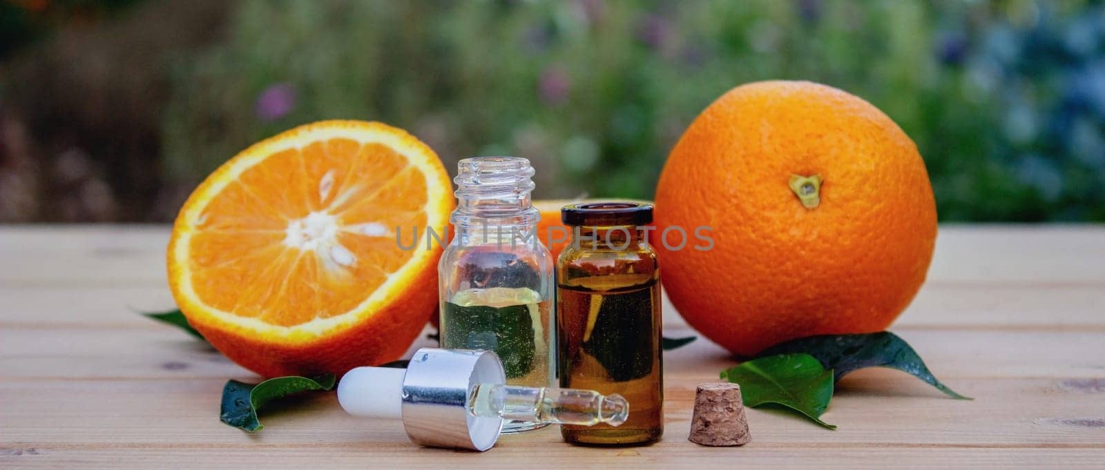 Essential extract of orange oil. Selective focus.