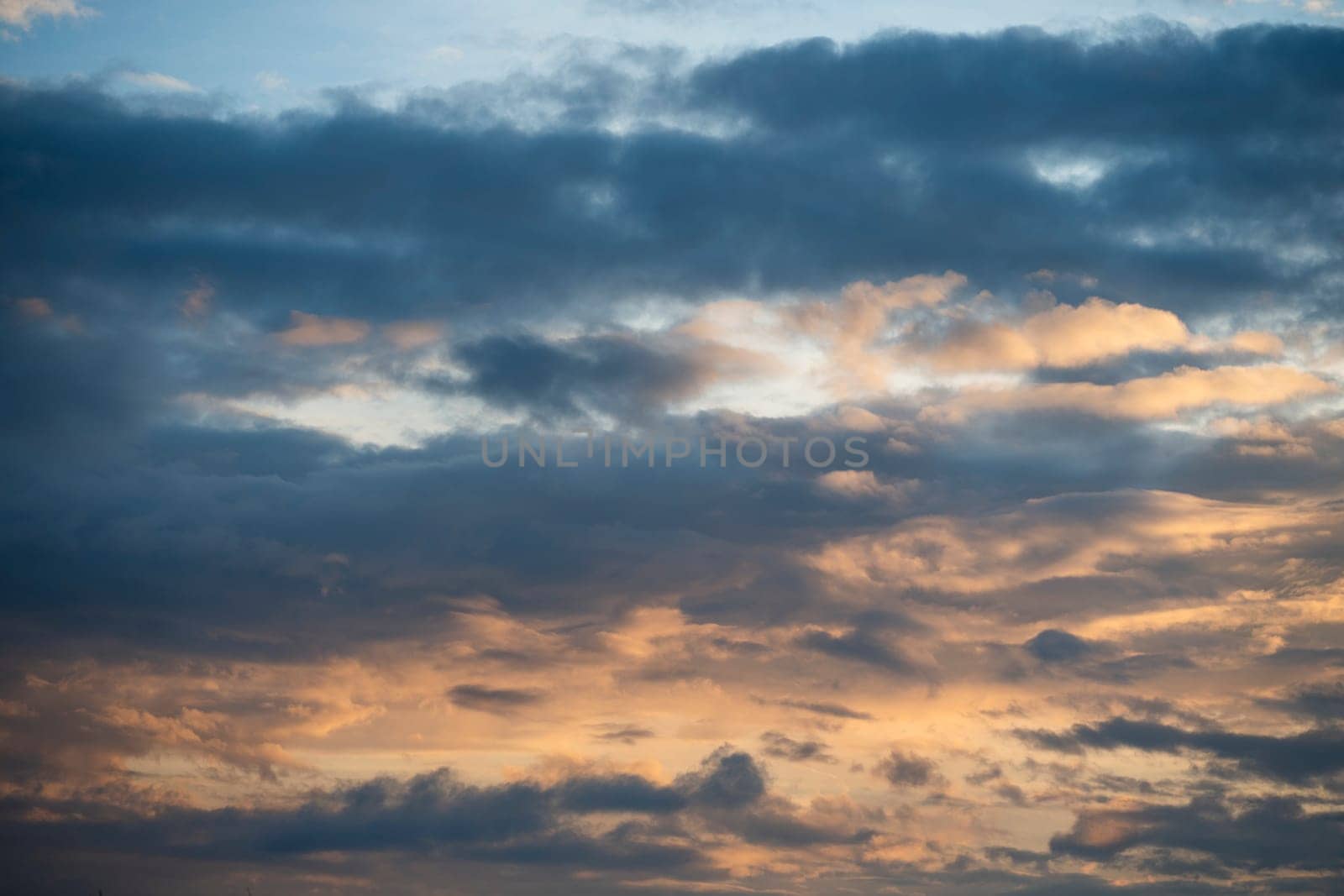 Sunrise background, Dramatic majestic scenery sunset, Sky with clouds in Sunrise sky light background. Sunrise with clouds in various shapes, High quality photo