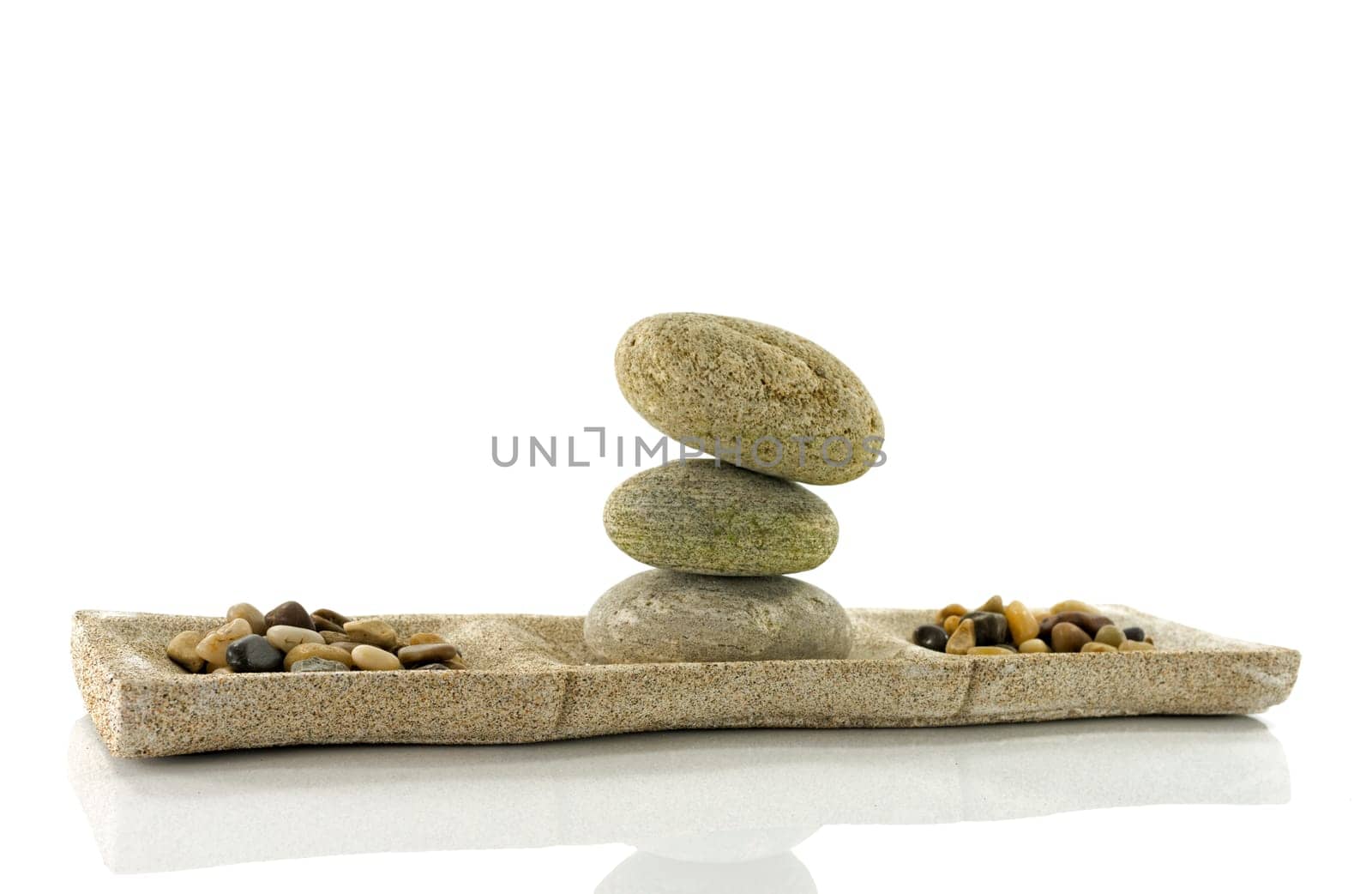 tower stack of stones in perfect balance isolated on white