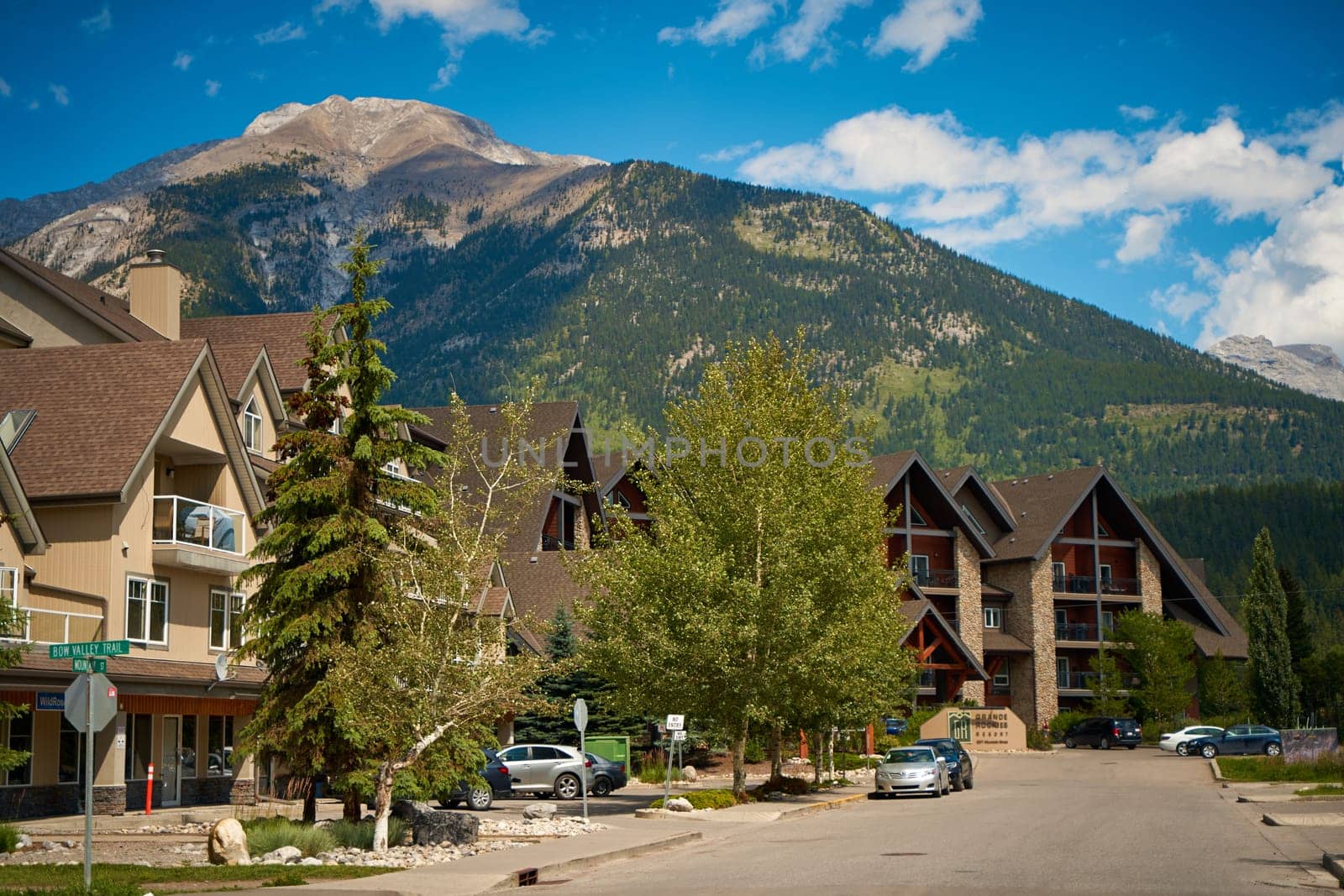 Beautiful picturesque old houses in the Canadian town of Canmore in the mountains. Canmore, Canada - 08.03.2023