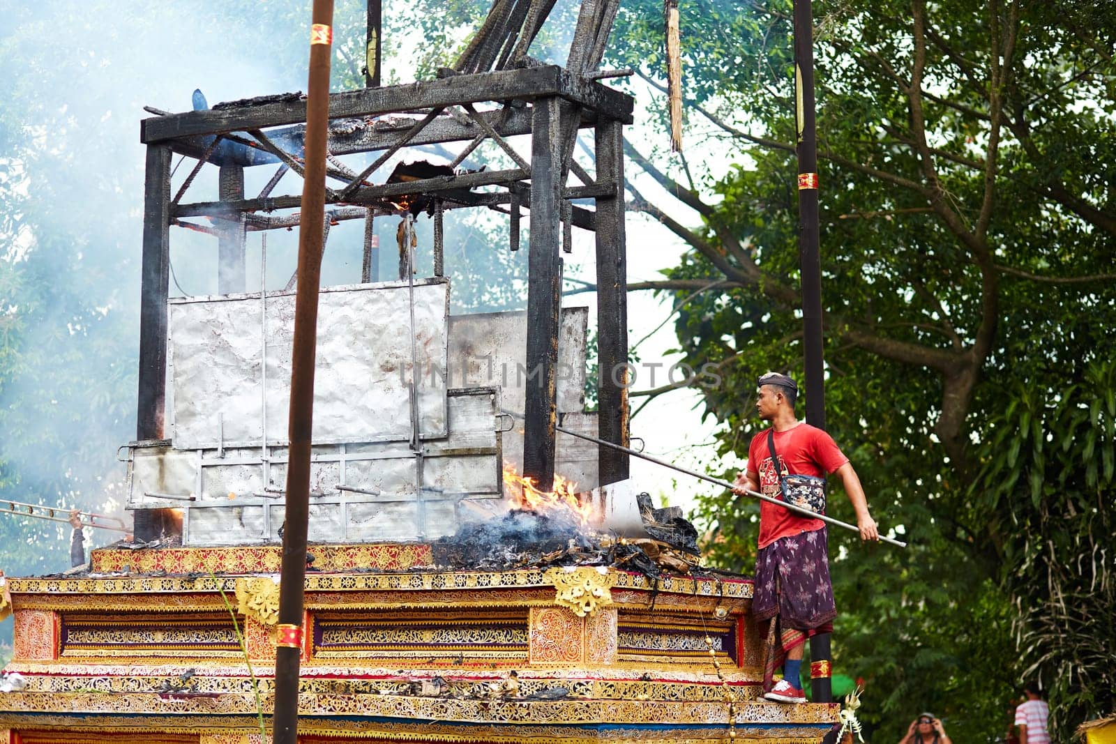The cremation ceremony for the burning of a bull sculpture in the small town of Ubud on the island of Bali. Bali, Indonesia - 03.02.2018