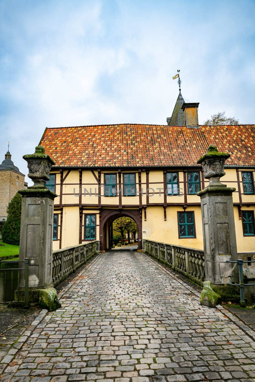 Outer bailey with gatehouse of the Burgsteinfurt moated castle in Steinfurt, Munsterland, North Rhine-Westphalia, Germany