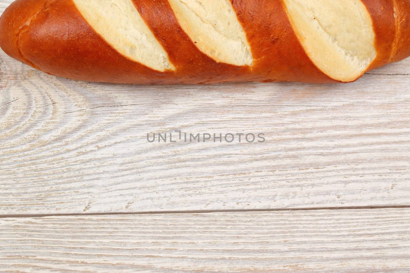This crafted loaf of bread has artistic cuts, making it perfect for exquisite culinary presentations