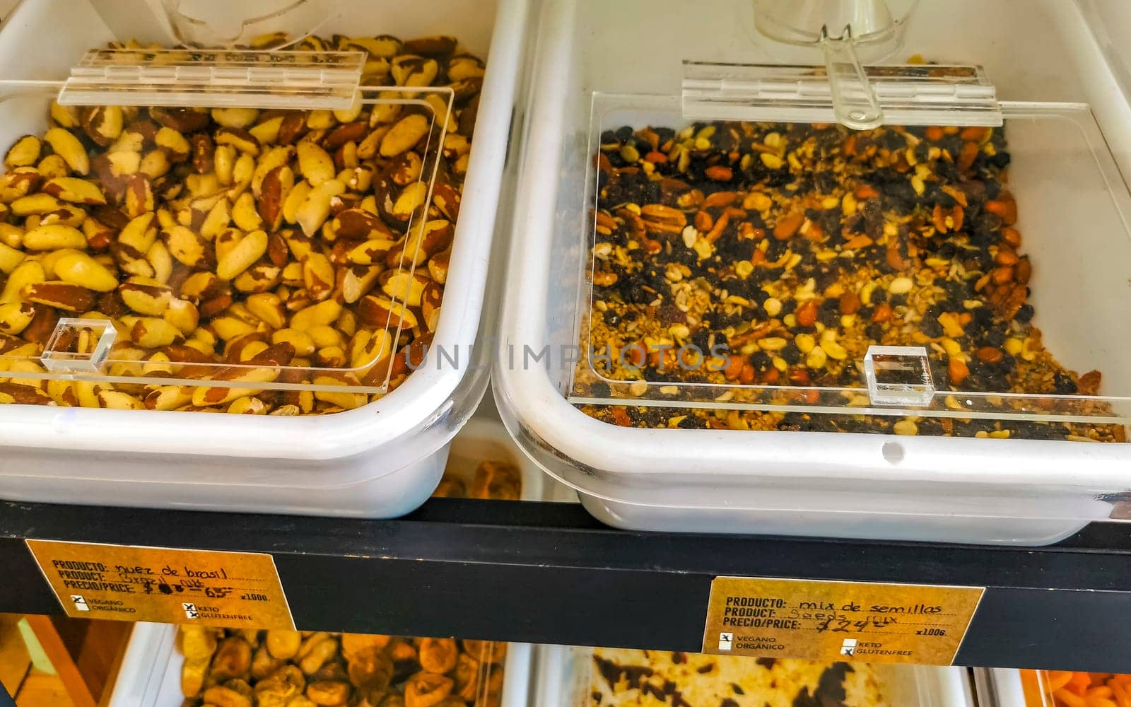 Self service organic store seeds nuts fruit in jars and containers in Zicatela Puerto Escondido Oaxaca Mexico.