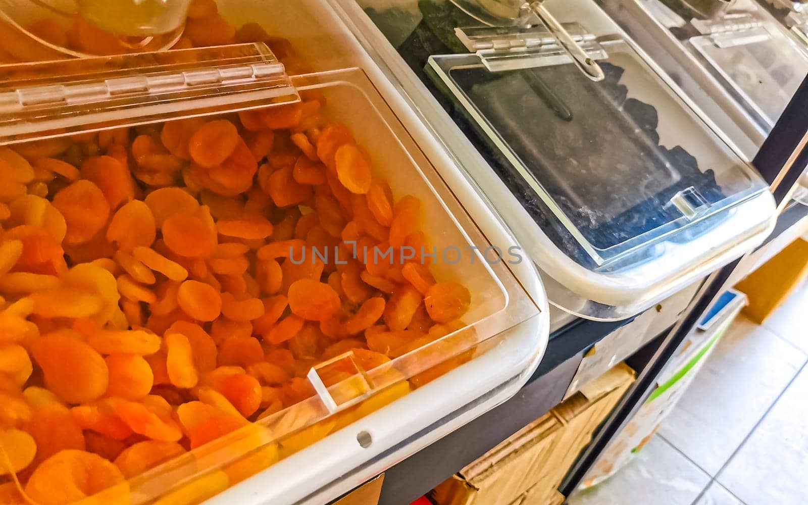 Self service organic store seeds nuts fruit in jars and containers in Zicatela Puerto Escondido Oaxaca Mexico.