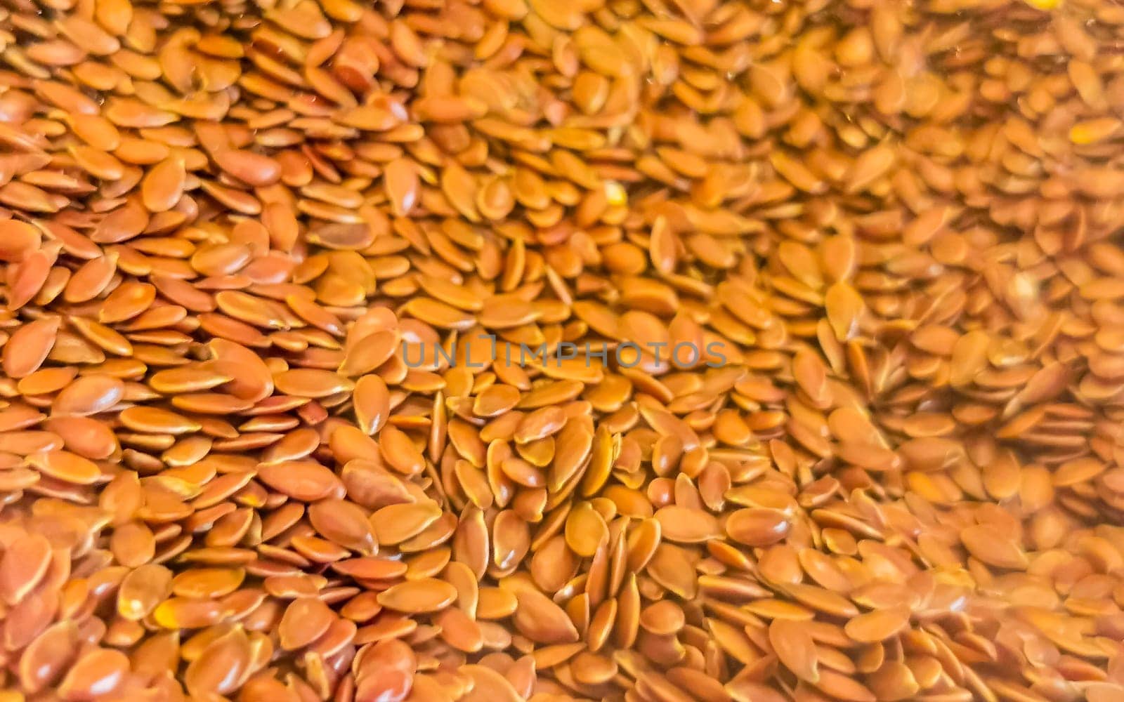 Lots of brown linseeds linseed flaxseed texture pattern in Zicatela Puerto Escondido Oaxaca Mexico.