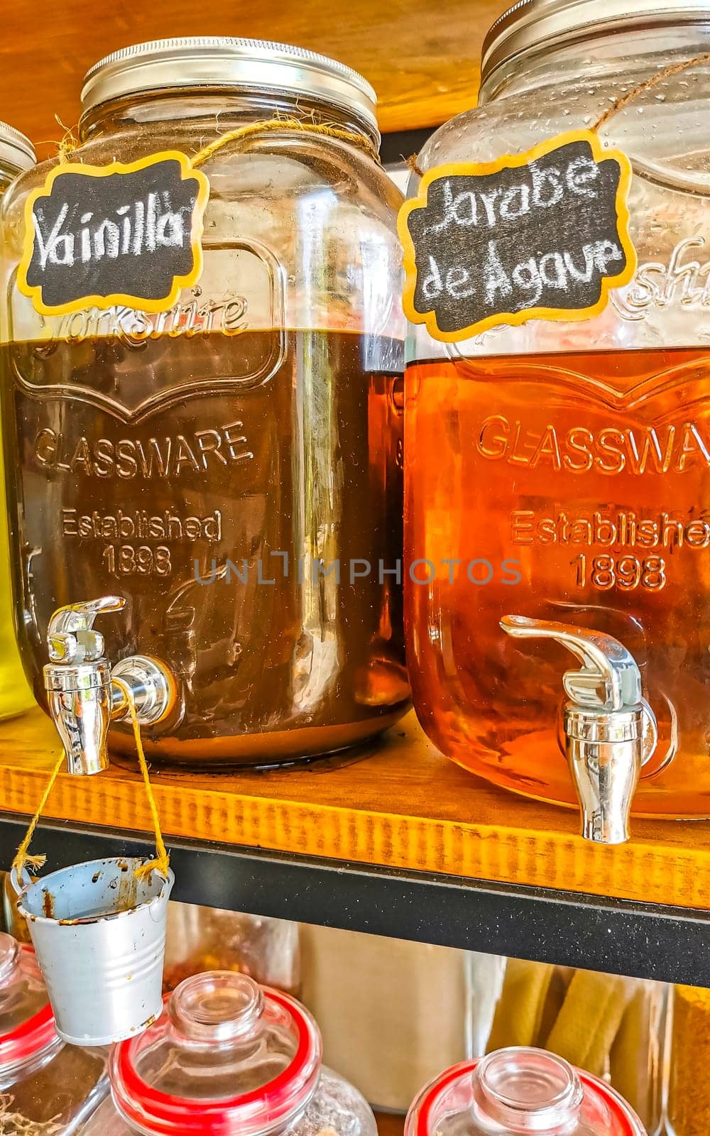 Organic store with self service oils and liquids in jars and bottles in Zicatela Puerto Escondido Oaxaca Mexico.