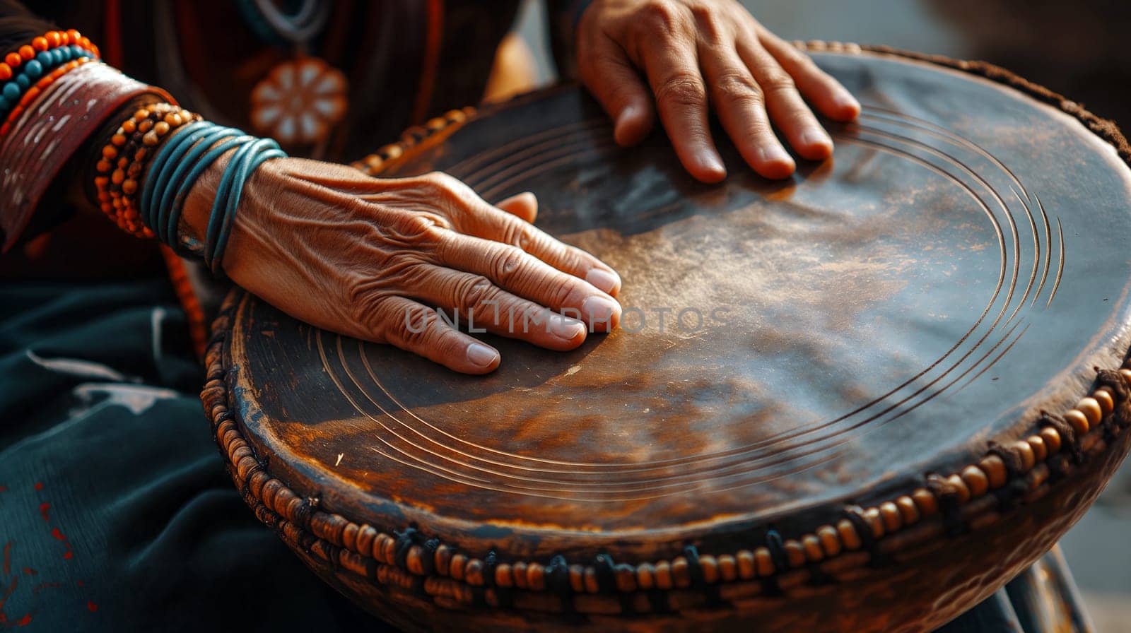A musician taps rhythmically on a handcrafted drum adorned with intricate designs, surrounded by a vibrant cultural atmosphere - Generative AI